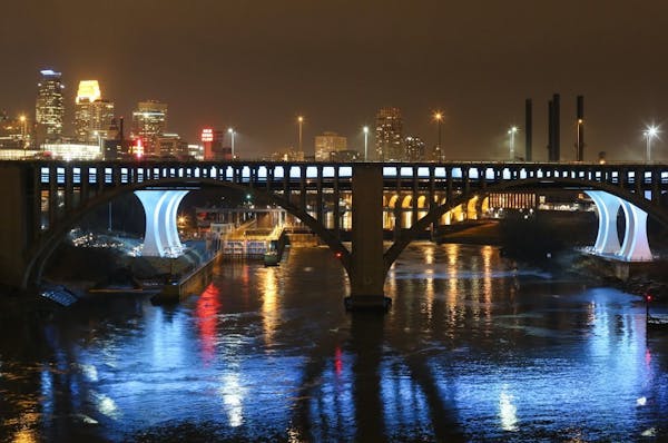 The 10th Ave Bridge photographed the night the body of a woman, likely to be Jennifer Houle, was found near where she was last seen going in the river