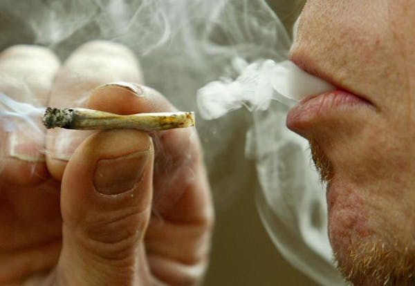 A man smokes marijuana recreationally in Toronto.