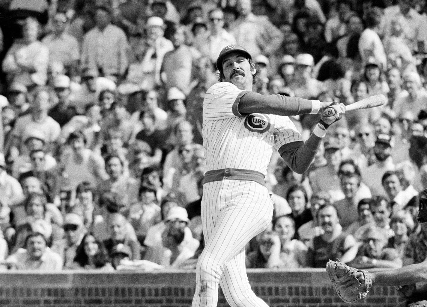 Chicago Cubs outfielder Dave Kingman sent a two-run homer toward the fence at Wrigley Field on May 17, 1979. Kingman hit three homers in the game and accounted for six runs as the Cubs lost to the Philadelphia Phillies, 23-22.