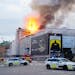 Fire and smoke rise out of the Old Stock Exchange, Boersen, in Copenhagen, Denmark, Tuesday, April 16, 2024. (Ida Marie Odgaard/Ritzau Scanpix via AP)