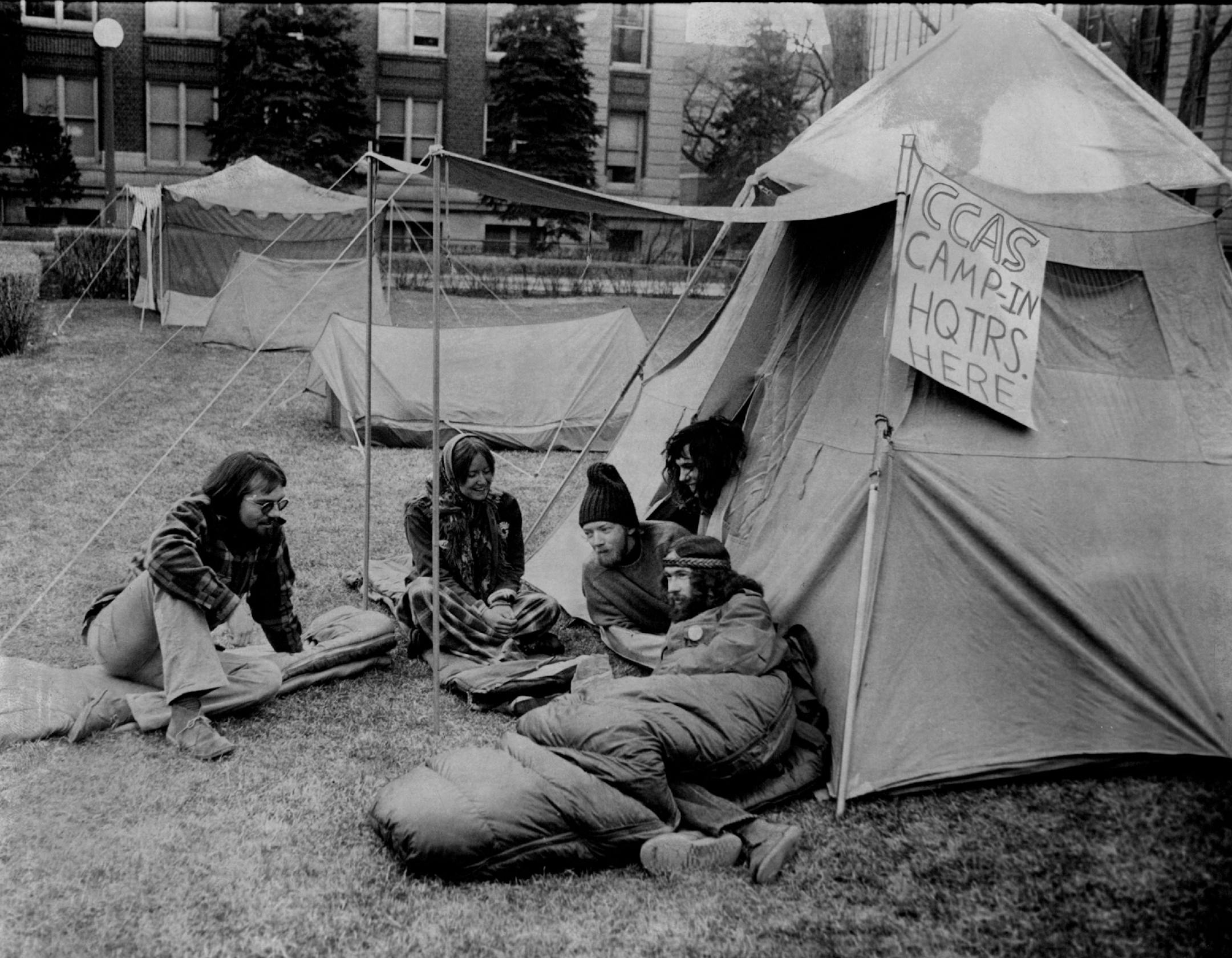 April 20, 1972 Camp-In - About 25 members of the Committee of Concerned Asian Scholars at the University of Minnesota pitched tents last night on the university mall to protest "dramatic escalation" of the war in Vietnam by President Nixon. They camped on the mall overnight. A commit­tee spokesman said the camp-in will be a focal point for antiwar activities on the campus. Roy Swan, Minneapolis Star Tribune