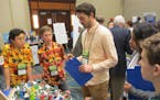 Justice Page students Oliver Gels, left, and Ryan Rowell presented their Maui cityscape to judges in Washington, D.C.