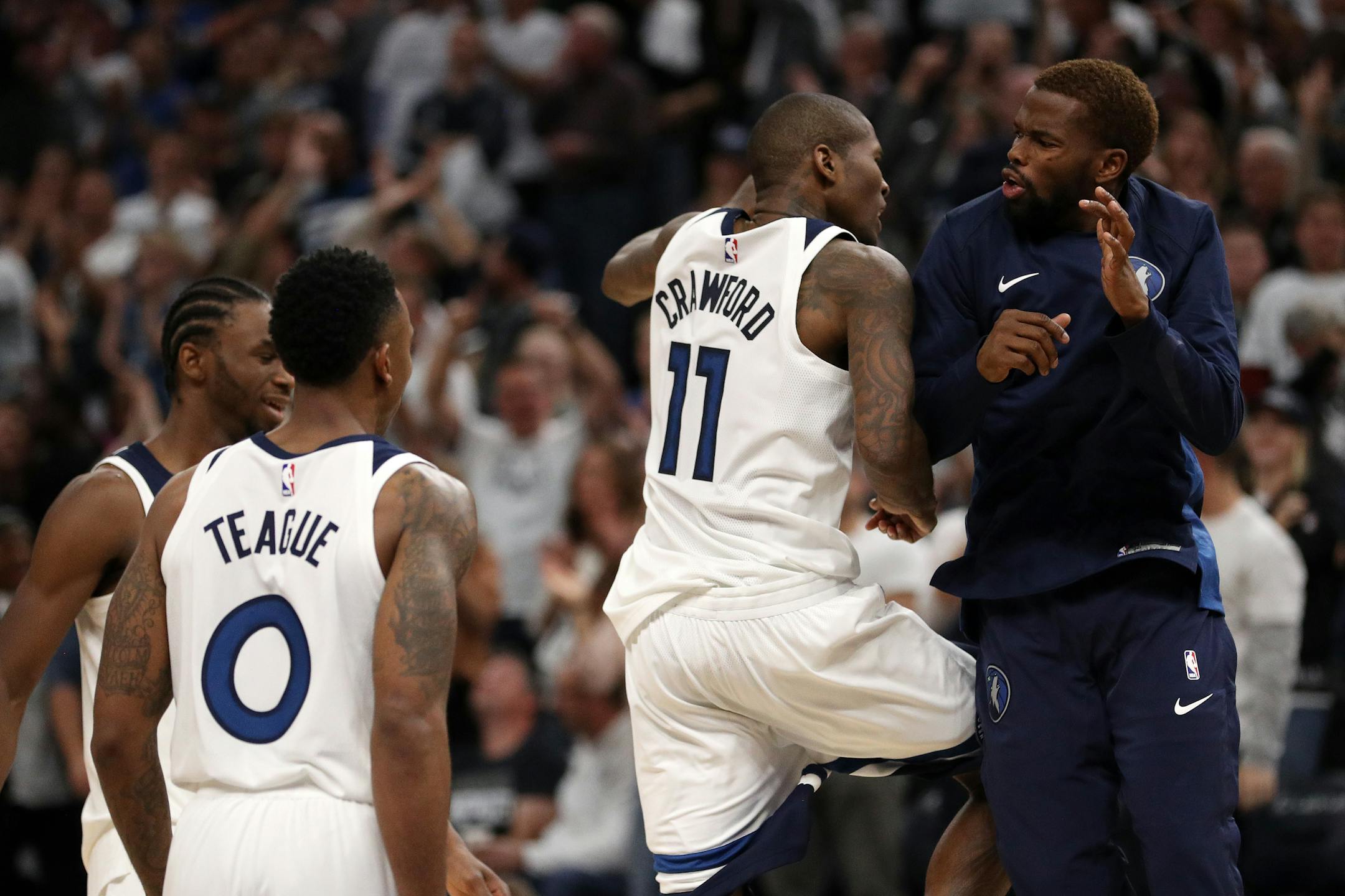 Minnesota Timberwolves guard Jamal Crawford (11) celebrated with his teammates after scoring a three point basket in the final minute of the second half. ] ANTHONY SOUFFLE � anthony.souffle@startribune.com Game action from an NBA game between the Minnesota Timberwolves and the Utah Jazz Friday, Oct. 20, 2017 at the Target Center in Minneapolis.