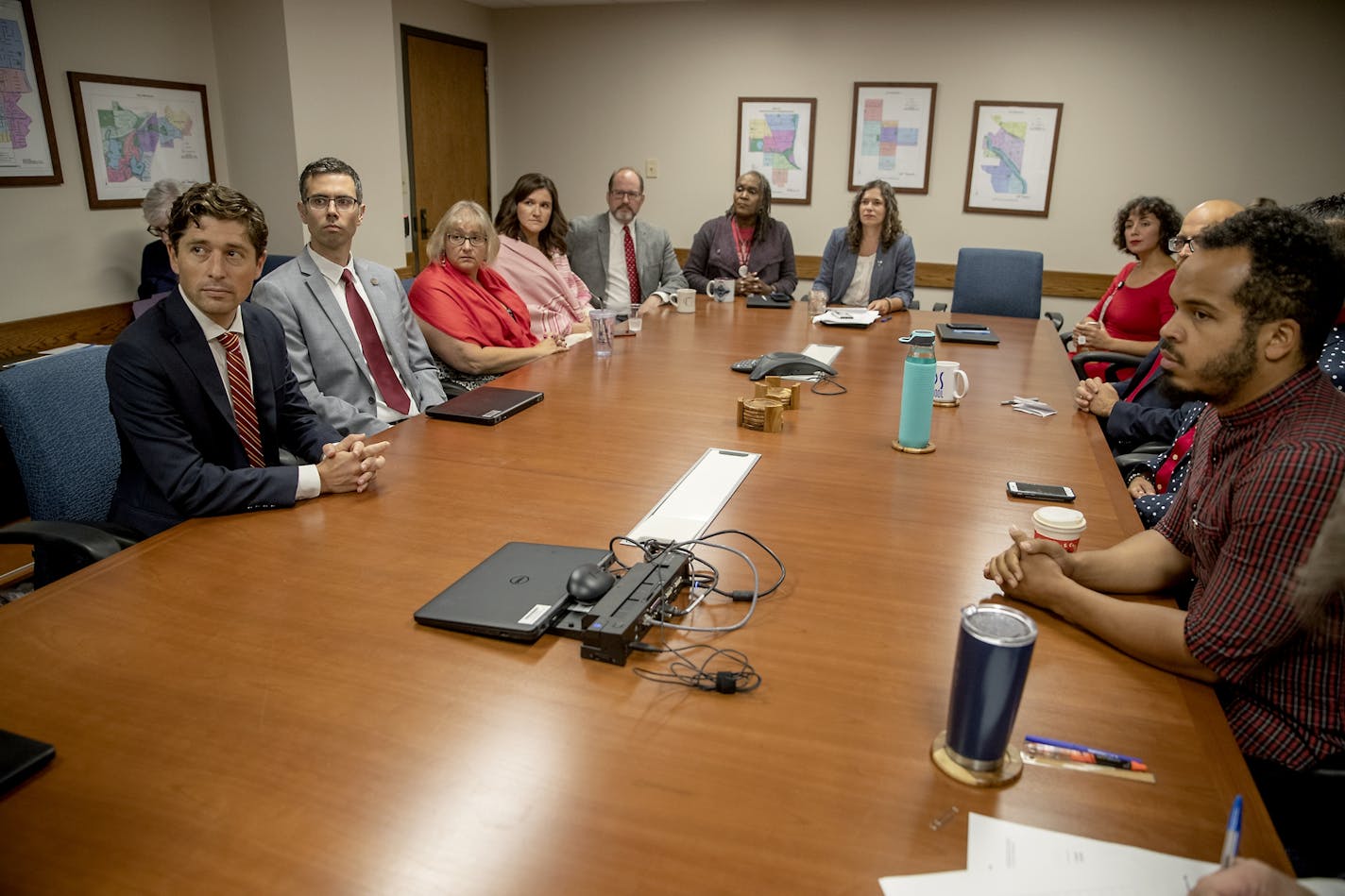 The Minneapolis City Council, including Mayor Jacob Frey, left, met in a closed meeting to review a $200,000 settlement with the family of Jamar Clark after their regular City Council meeting at City Hall, Friday, August 23, 2019 in Minneapolis, MN.