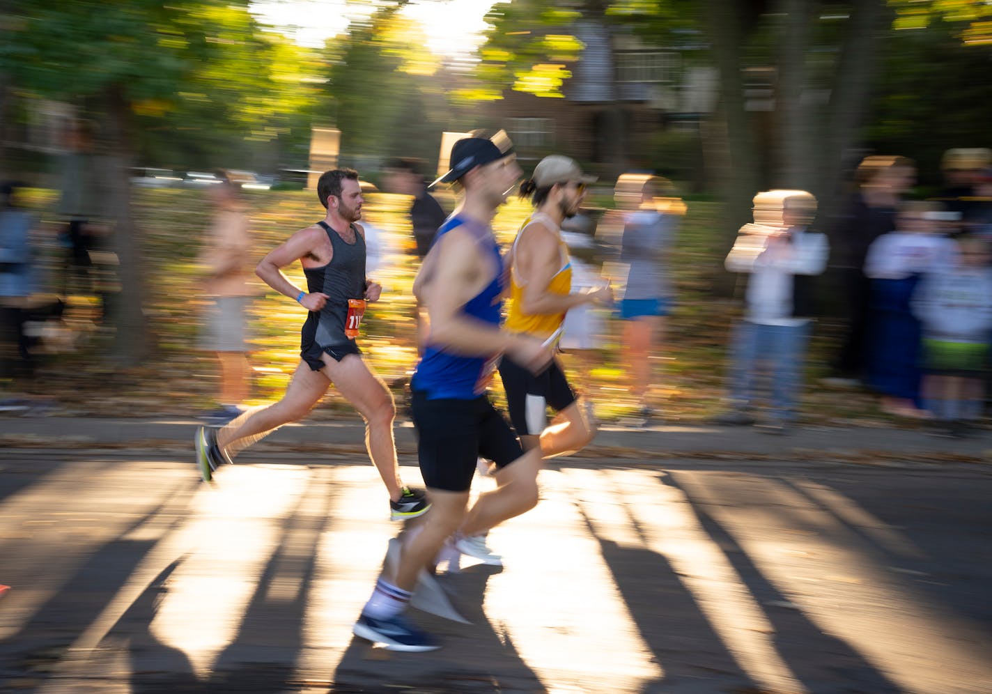 Spectators cheered leading runners along as they passed by on E. Lake Harriet Parkway on Sunday morning.