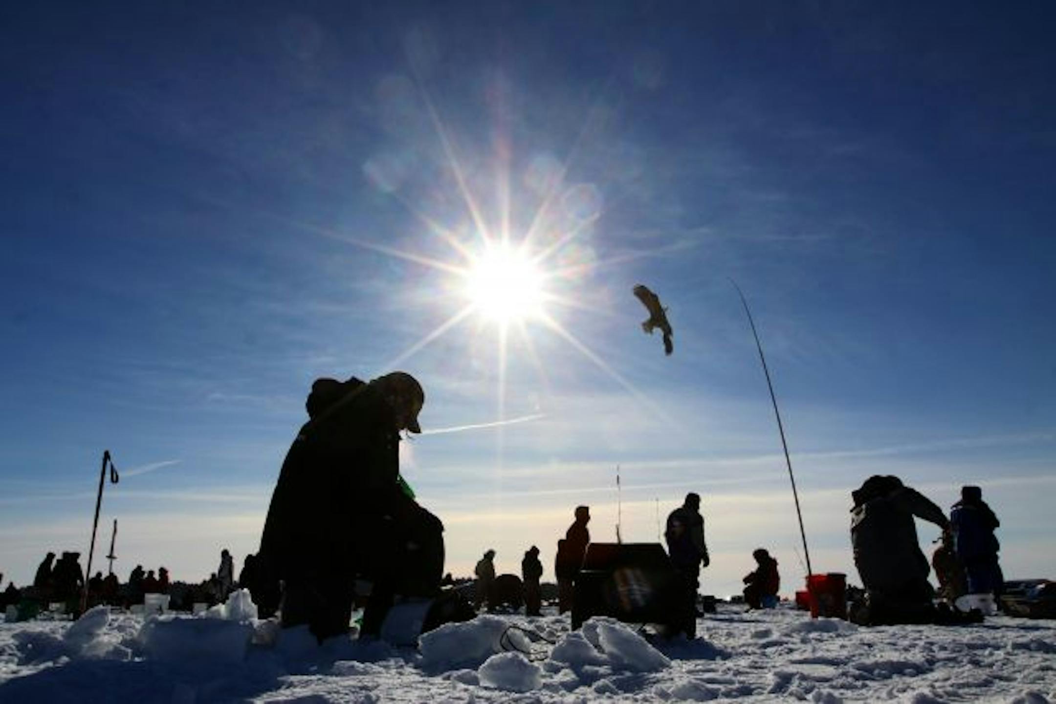 The ice fishing spectacle on Gull Lake is in its 21st year. Anglers vied for $190,000 in prizes Saturday. An interloper from Wisconsin won the top prize, a Ford pickup, for catching a 7.18-pound northern just 15 minutes into the contest.
