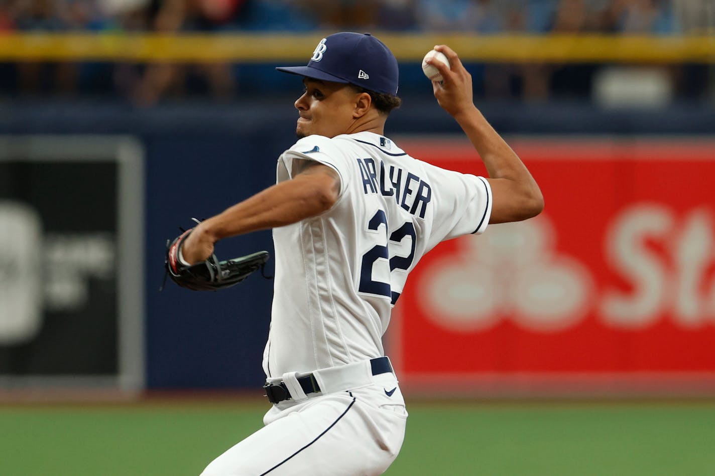 FILE - Tampa Bay Rays starting pitcher Chris Archer winds up during a baseball game against the Minnesota Twins, Sept. 4, 2021, in St. Petersburg, Fla. The Twins signed veteran right-hander Archer to a one-year contract on Monday, March 28, 2022, a potential boost for their rotation with a two-time All-Star who's coming off an injury-ruined season. (AP Photo/Scott Audette, File)