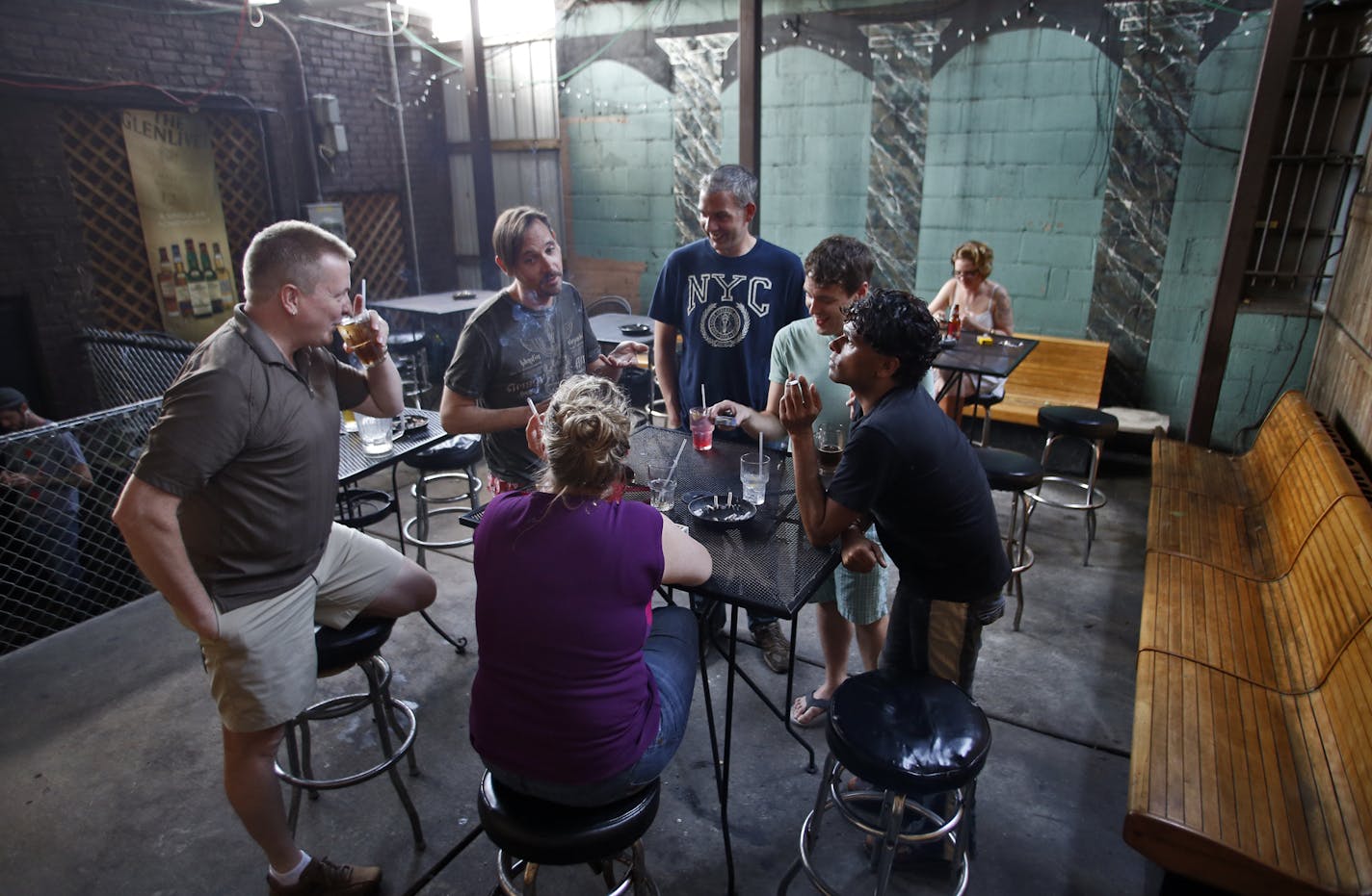 The 19 Bar in downtown Minneapolis has been in business as a gay bar for 61 years. Customers in the patio area of the bar on a recent weekend night. (MARLIN LEVISON/STARTRIBUNE(mlevison@startribune.com (cq )