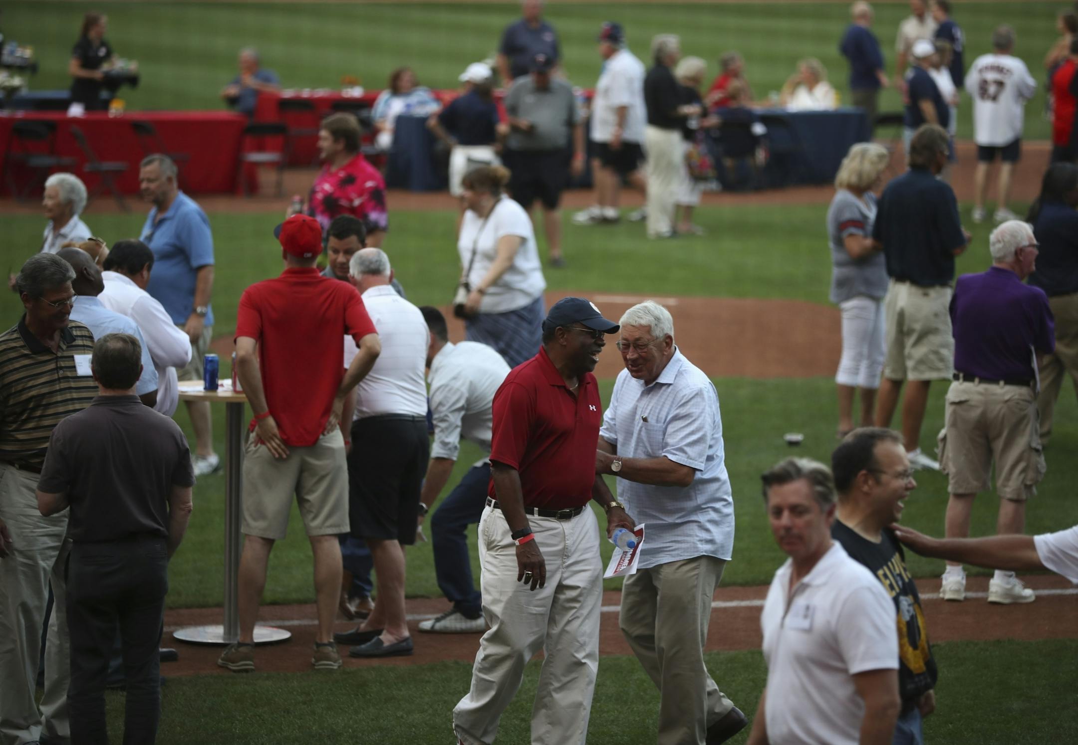 Fans and players visited in the infield during the Twins' 1987 Summer Celebration Thursday night.
