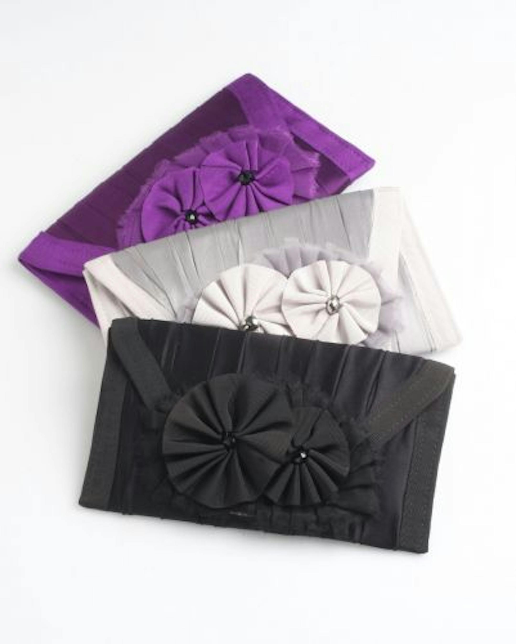 Clutch, $110, by Nelle Handbags Who: Laura Nelli of Minneapolis. Back story: Nelli has been making and selling handbags for five years. She did a capsule collection for Juut that includes clutches and headbands with flower buds. Claim to fame: Jill Biden carried a navy Perfectly Petersham clutch to the November state dinner for India's prime minister. Buy it: Juut locations (visit www.juut.com). Additional products available at www.nelle handbags.com.
