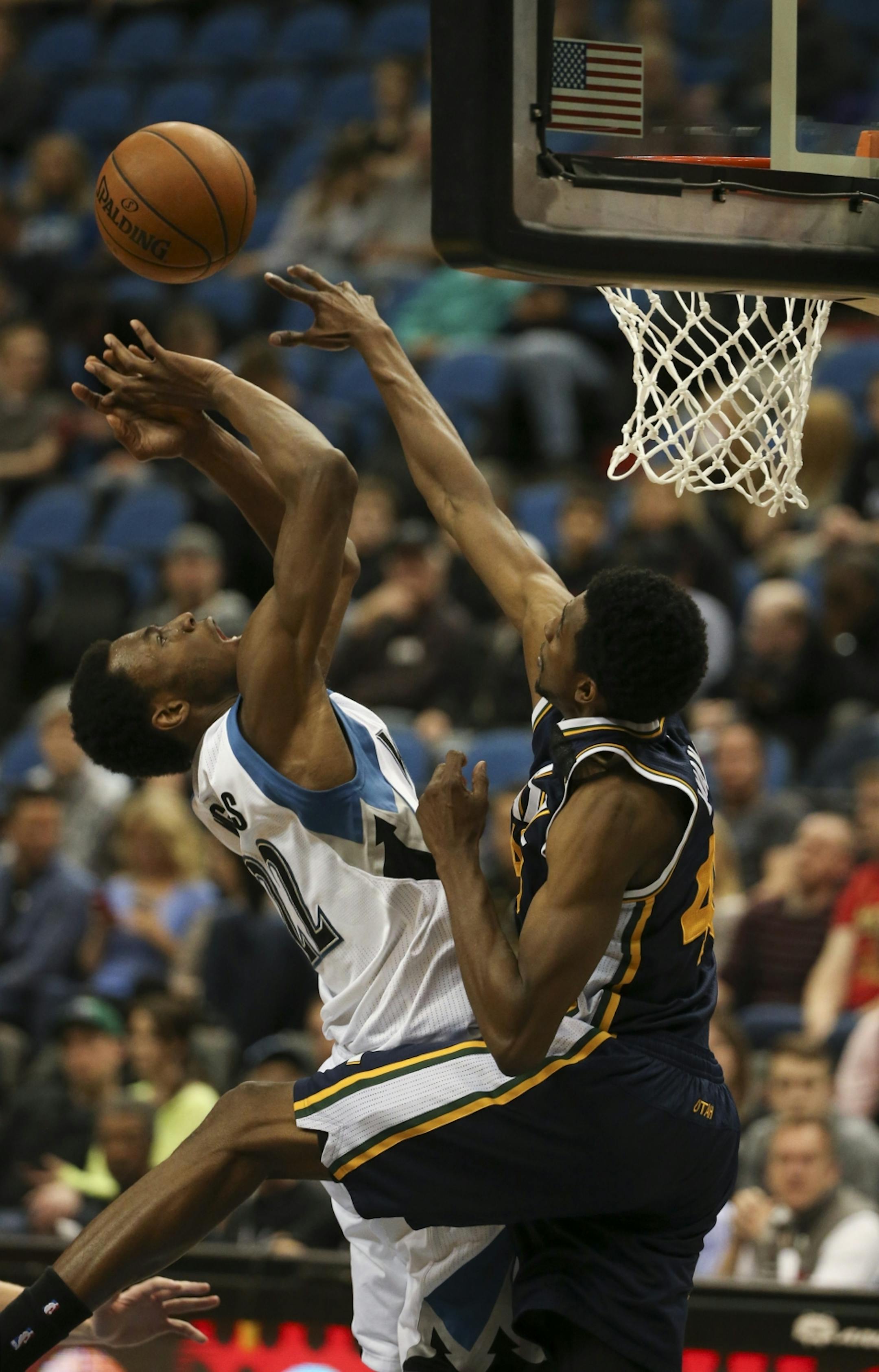 Minnesota Timberwolves forward Andrew Wiggins was fouled by Jazz forward Jeremy Evans as he shot in the fourth quarter Monday night at Target Center. Wiggins finished with 17 points in the loss.