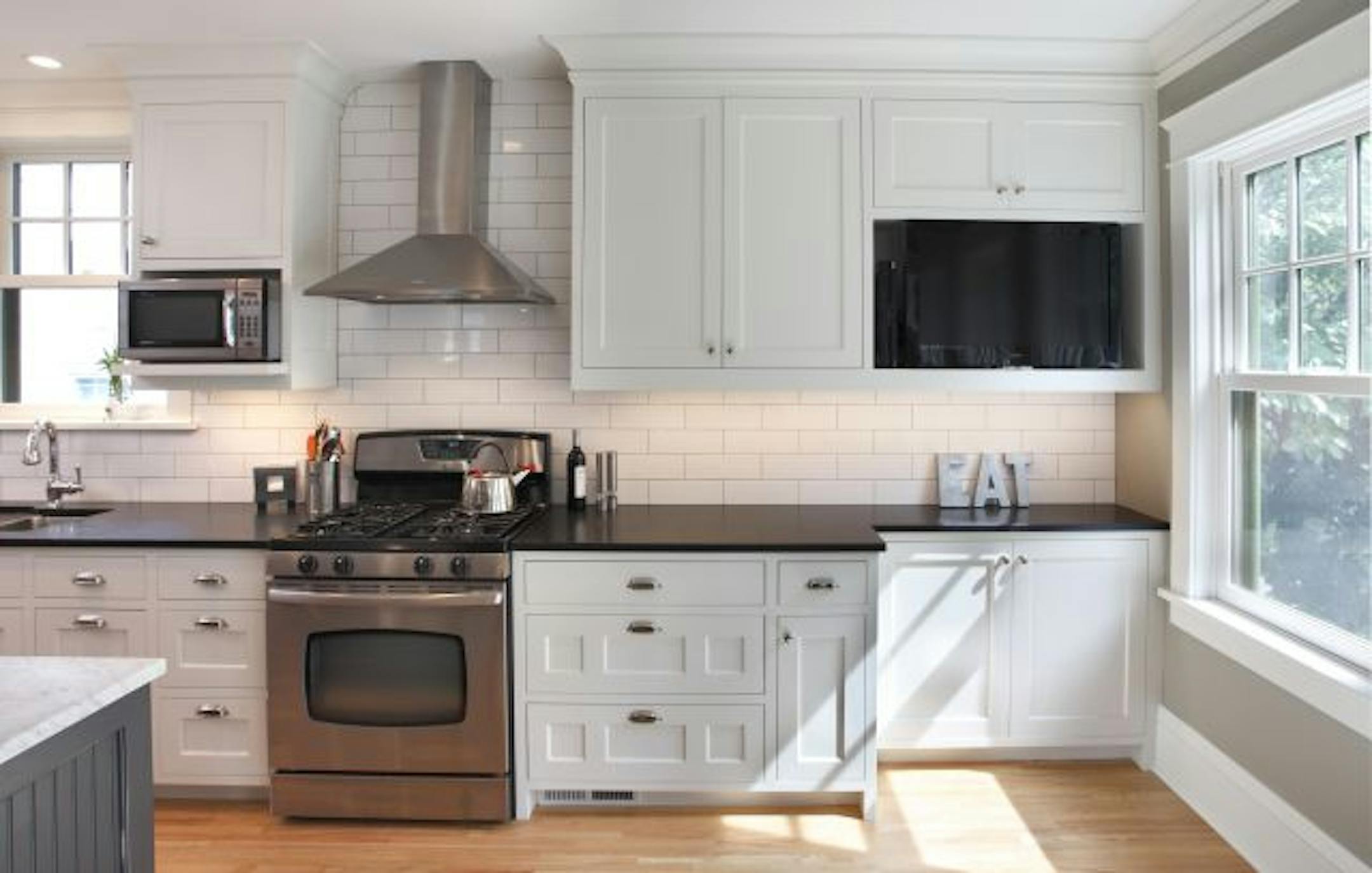 The Jablonskis' cheery new kitchen is three times the size of the old one and is part of the multilevel, back-of-the house addition.