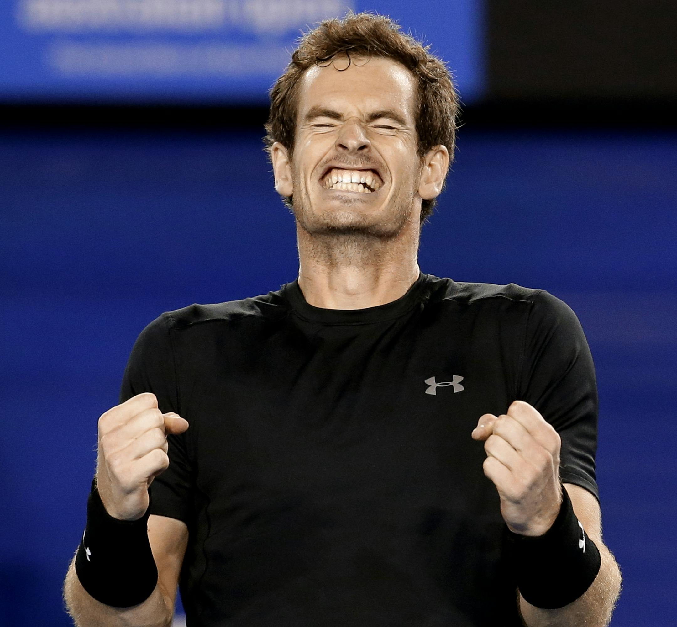 Andy Murray of Britain celebrates after defeating Tomas Berdych of the Czech Republic in their semifinal match at the Australian Open tennis championship in Melbourne, Australia, Thursday, Jan. 29, 2015. (AP Photo/Lee Jin-man)