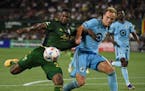 Minnesota United's Chase Gaspar, right, battled for the ball with Portland's Dairon Asprilla during the second half Saturday, June 26, 2021 at Provide