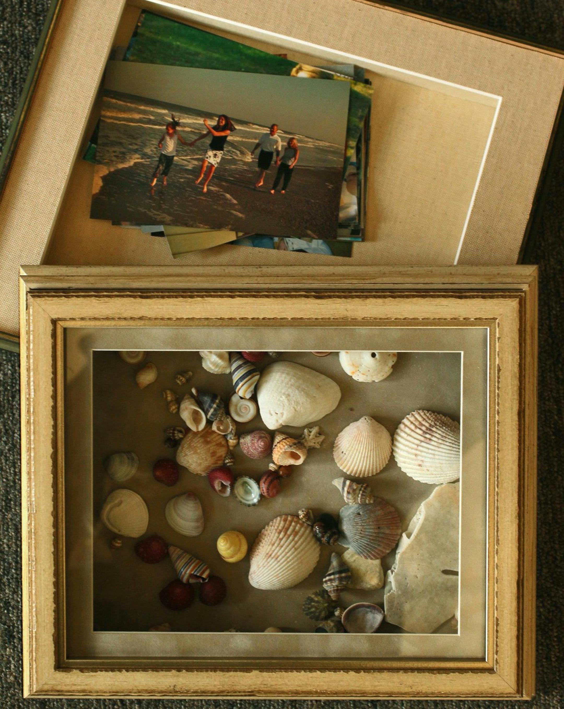 An example, created at Hazel Tree Interiors, of how you can use photos and mementos to create a Keepsake box using frames in Akron, Ohio, on Oct. 25, 2013. (Ed Suba Jr./Akron Beacon Journal/MCT)