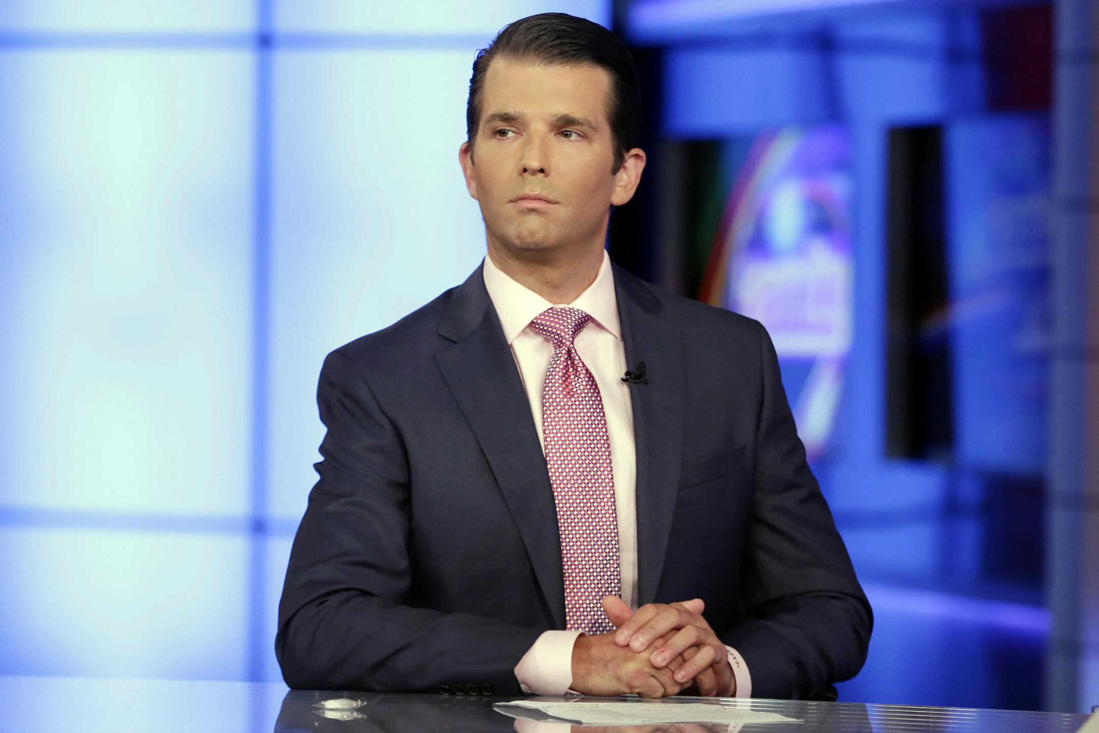In this July 11, 2017, photo, Donald Trump Jr. is interviewed by host Sean Hannity on the Fox News Channel television program, in New York.