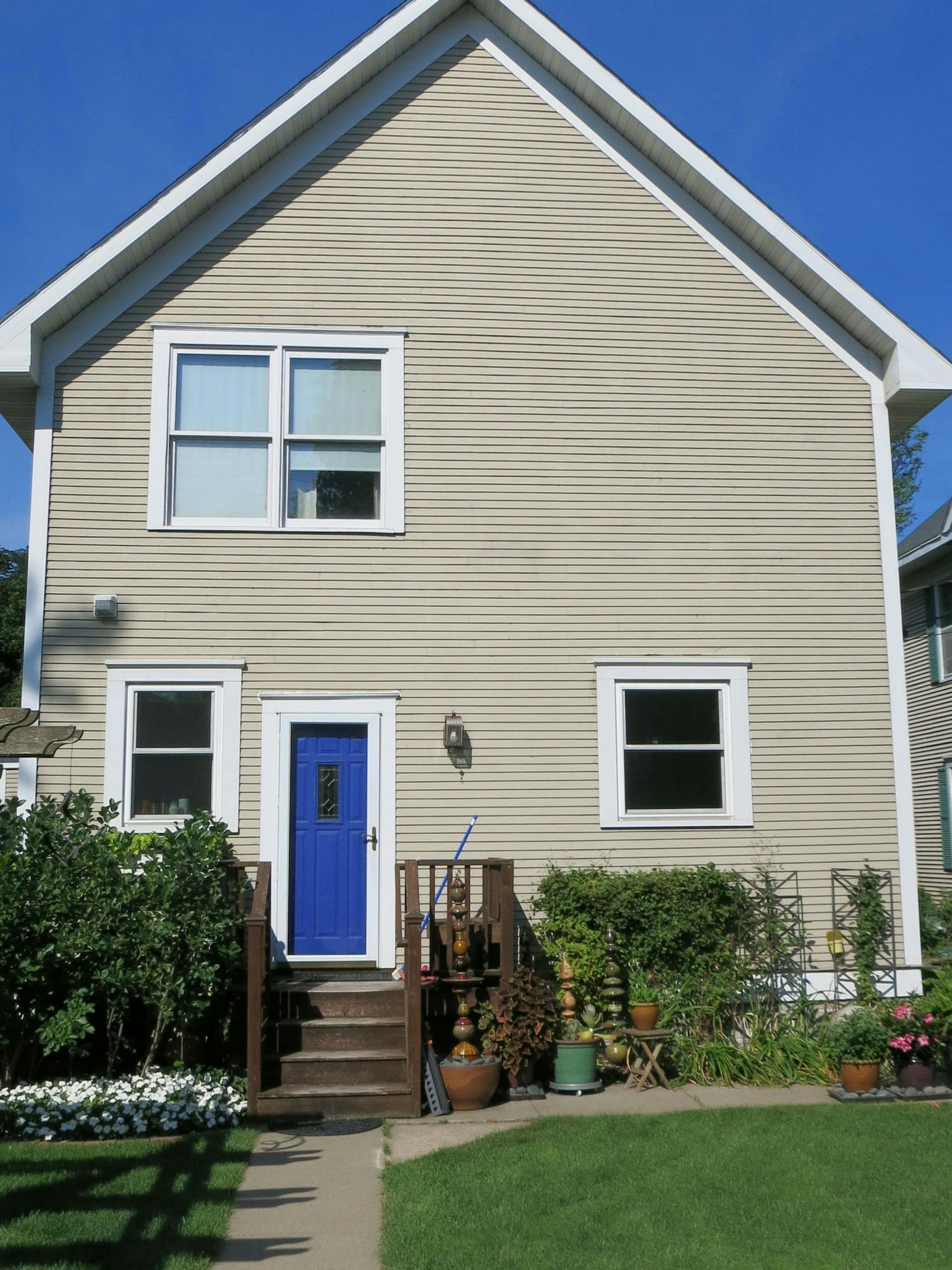 BEFORE Porch and upper balcony addition by David Heide Design Studio.