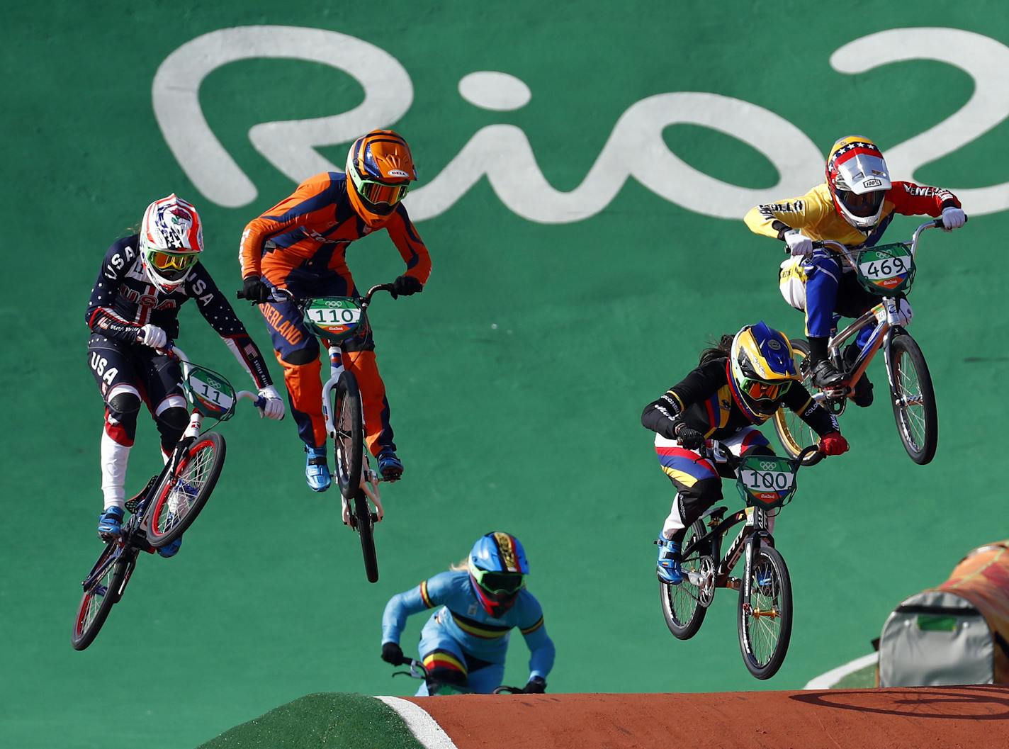 Alise Post of the United States, from left, Laura Smulders of the Netherlands, Mariana Pajon of Colombia and Stefany Hernandez of Venezuela compete in the women's BMX cycling final during the 2016 Olympic Games in Rio de Janeiro, Brazil, Friday, Aug. 19, 2016. (AP Photo/Patrick Semansky)