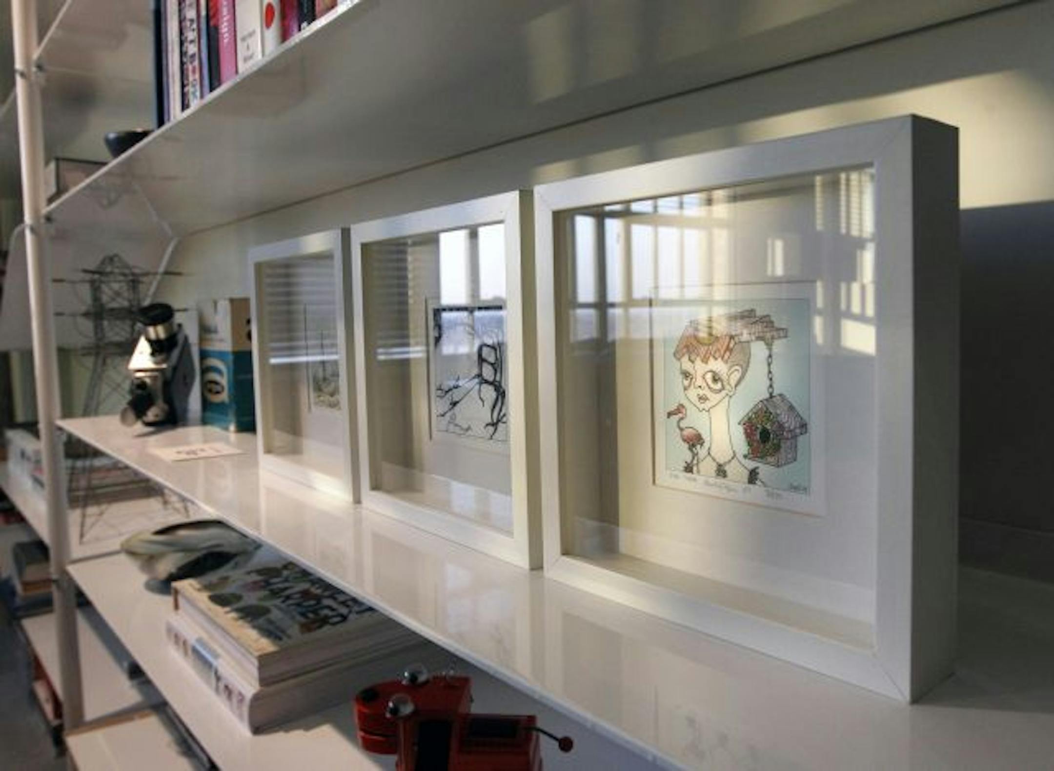 Michael Jones' custom bookcase showcases art.