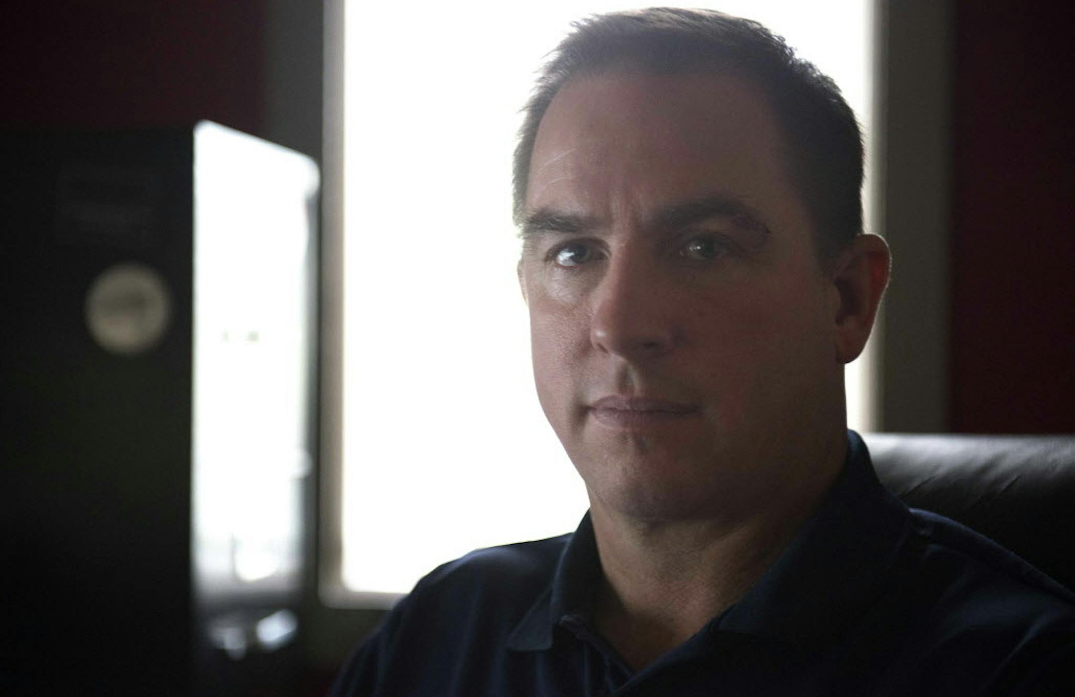 In this Wednesday, April 1, 2015 photo, Jeff Salter, CEO of Caring Senior Service, poses for a photo in his company office building in San Antonio. Last December, the network of nearly 30 computers at Caring Senior Service were invaded by ransomware, software hackers use to try to extort money from people and businesses that canít open or use documents, pictures, spreadsheets and other files. (AP Photo/Matthew Busch) ORG XMIT: NYBZ192