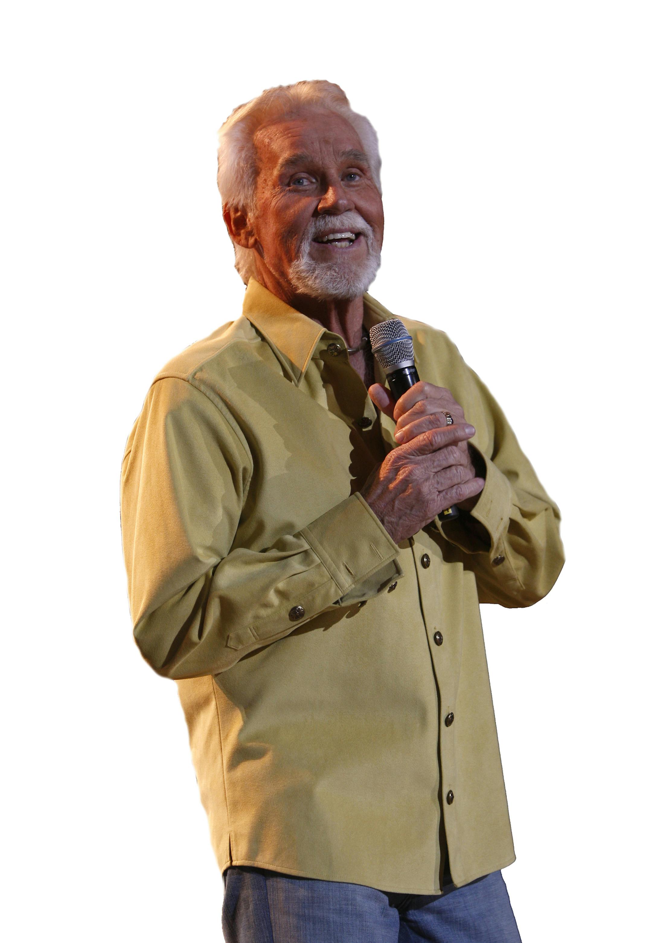 Singer Kenny Rogers performs at the Manchester Evening News Arena, Manchester, England, Sunday March. 29, 2009. (AP Photo/Jon Super)