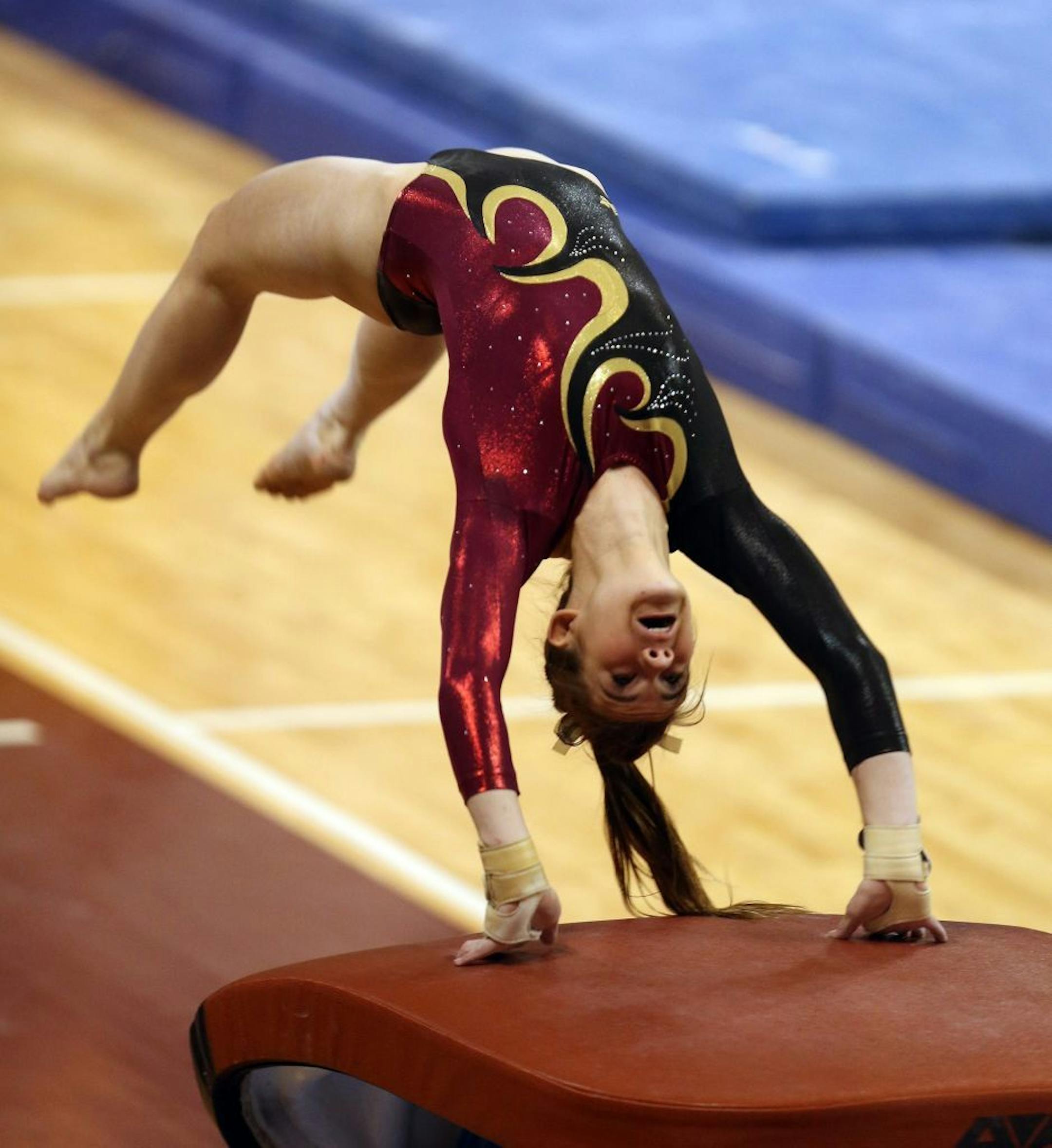 Northfield's Bailey DuPay performed on the vault during the Class 2A gymnastics state meet at the Sport Pavilion in Minneapolis Saturday, February 22, 2014