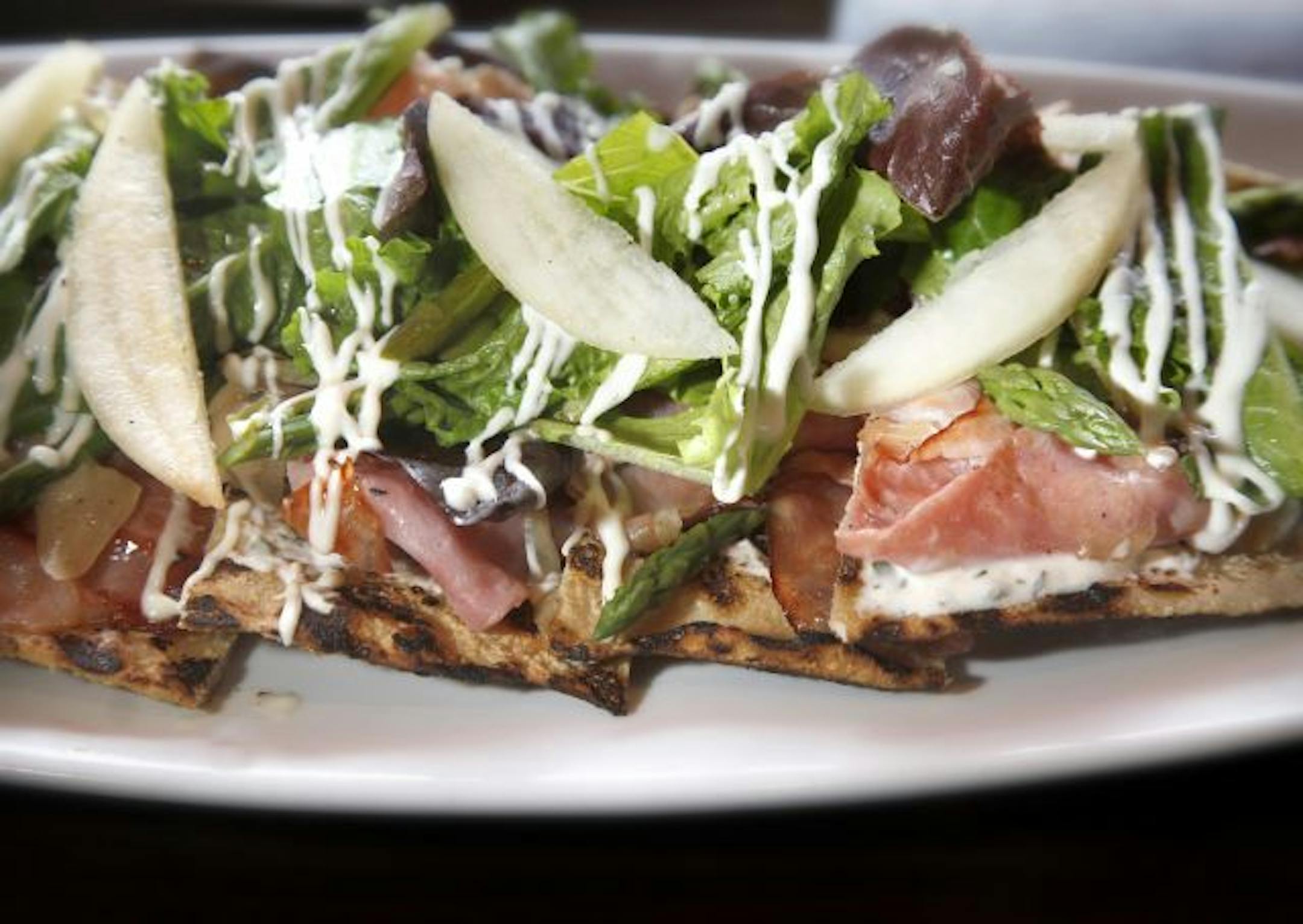 A ham-pear flatbread from Cafe Maude.