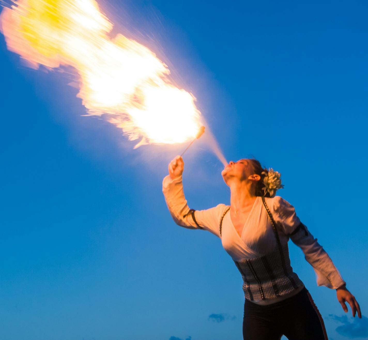 Woman fire eater