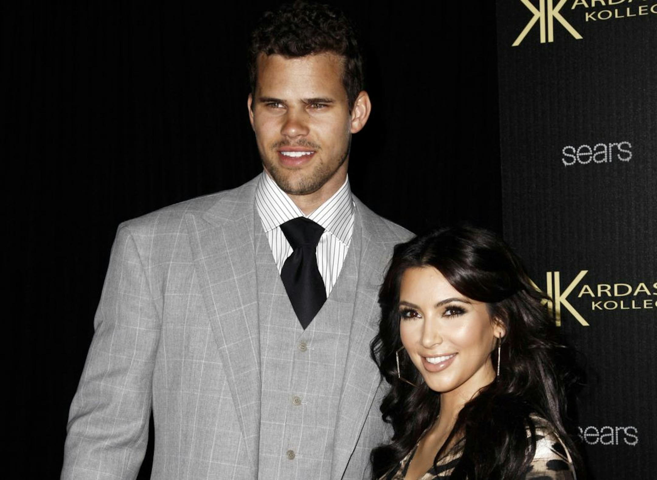 In this Aug. 17, 2011 file photo, Kim Kardashian and her fiance, NBA basketball player Kris Humphries, arrive at the Kardashian Kollection launch party in Los Angeles.