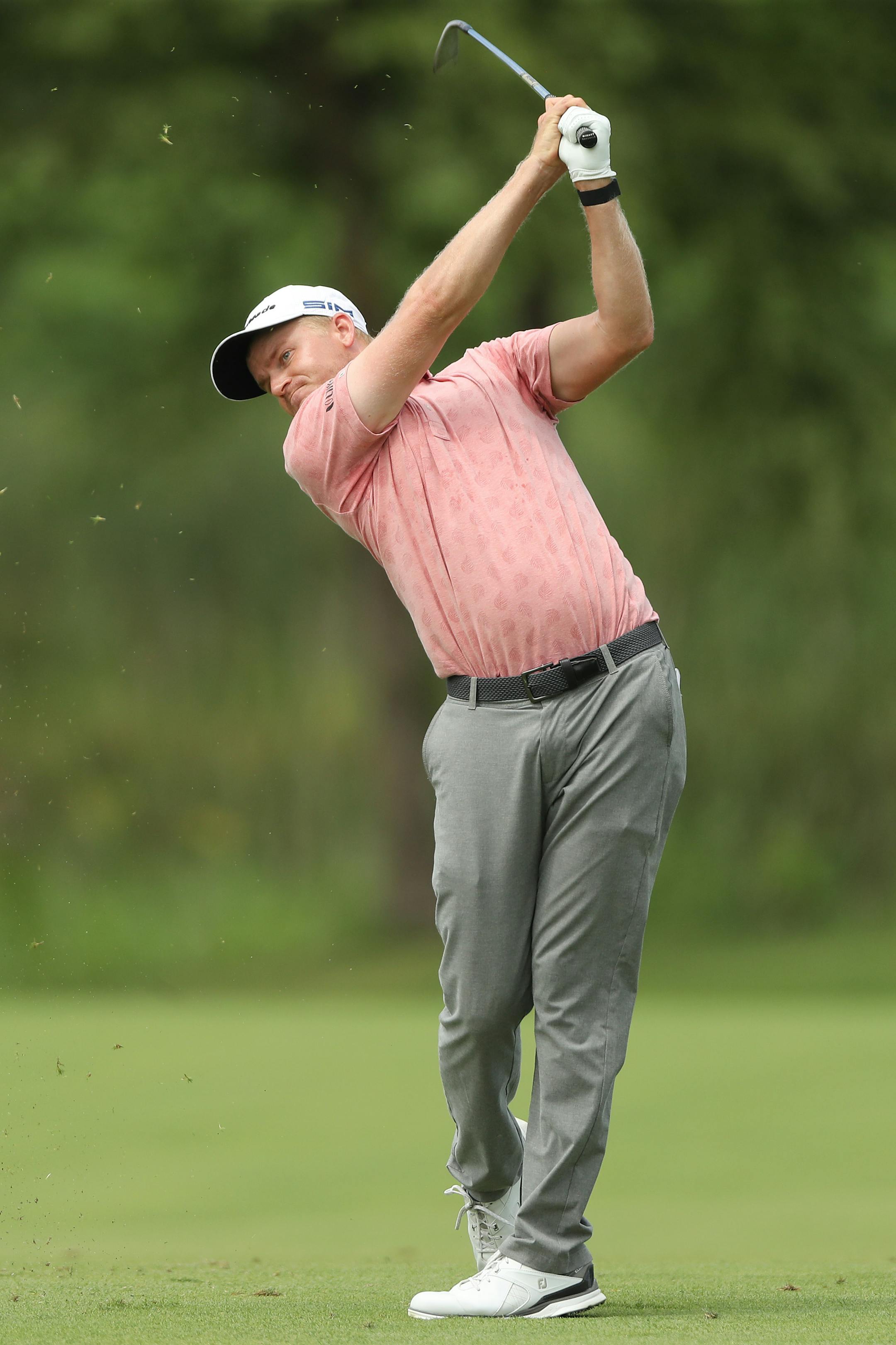 BLAINE, MINNESOTA - JULY 26: Adam Long of the United States plays a shot on the tenth hole during the final round of the 3M Open on July 26, 2020 at TPC Twin Cities in Blaine, Minnesota. (Photo by Matthew Stockman/Getty Images)