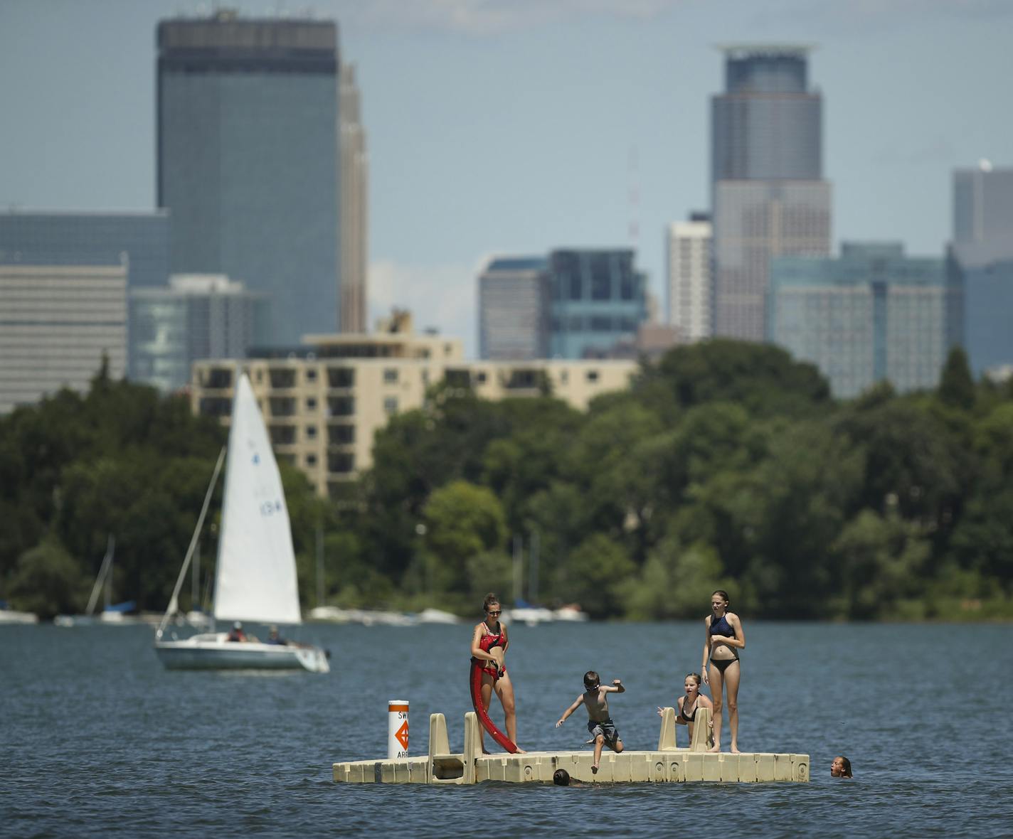 Kids jumped off the raft off Thomas Beach into Lake Bde Maka Ska Monday afternoon. ] JEFF WHEELER &#xef; jeff.wheeler@startribune.com Following the lead of the Minneapolis Park and Recreation Board and the Minnesota Department of Natural Resources, the federal government now recognizes Lake Calhoun as Lake Bde Maka Ska. Swimmers jumped off the raft off Thomas Beach into Lake Bde Maka Ska Monday afternoon, July 16, 2018.