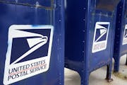 Mailboxes in Omaha, Neb., Tuesday, Aug. 18, 2020. The Postmaster general announced Tuesday he is halting some operational changes to mail delivery tha