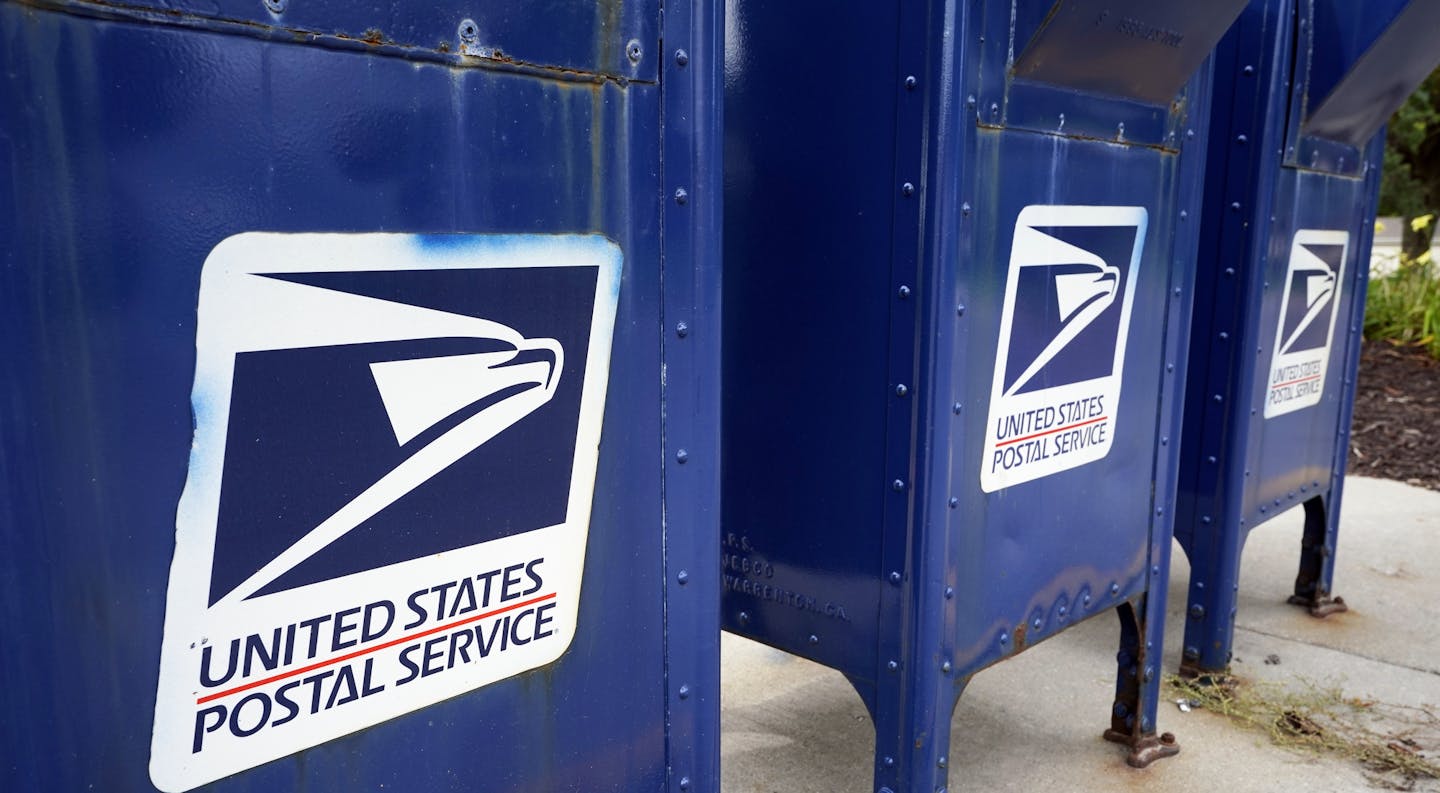 Mailboxes in Omaha, Neb., Tuesday, Aug. 18, 2020. The Postmaster general announced Tuesday he is halting some operational changes to mail delivery that critics warned were causing widespread delays and could disrupt voting in the November election. Postmaster General Louis DeJoy said he would "suspend" his initiatives until after the election "to avoid even the appearance of impact on election mail." (AP Photo/Nati Harnik)