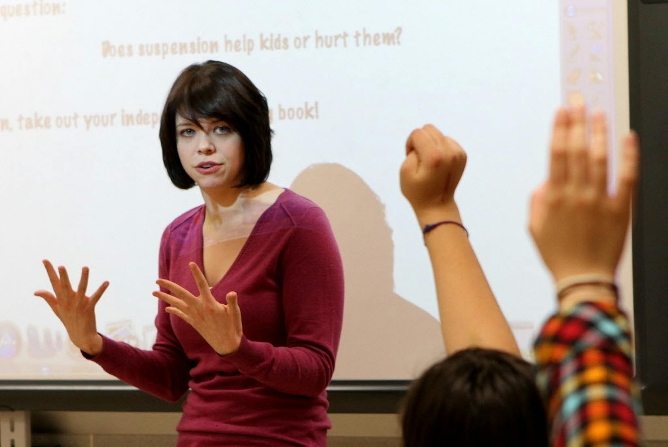In a Feb. 4, 2011 photo, Erin Gavin, a Teach for America teacher, led a group discussion with seventh-graders at Brooklyn Center High School.