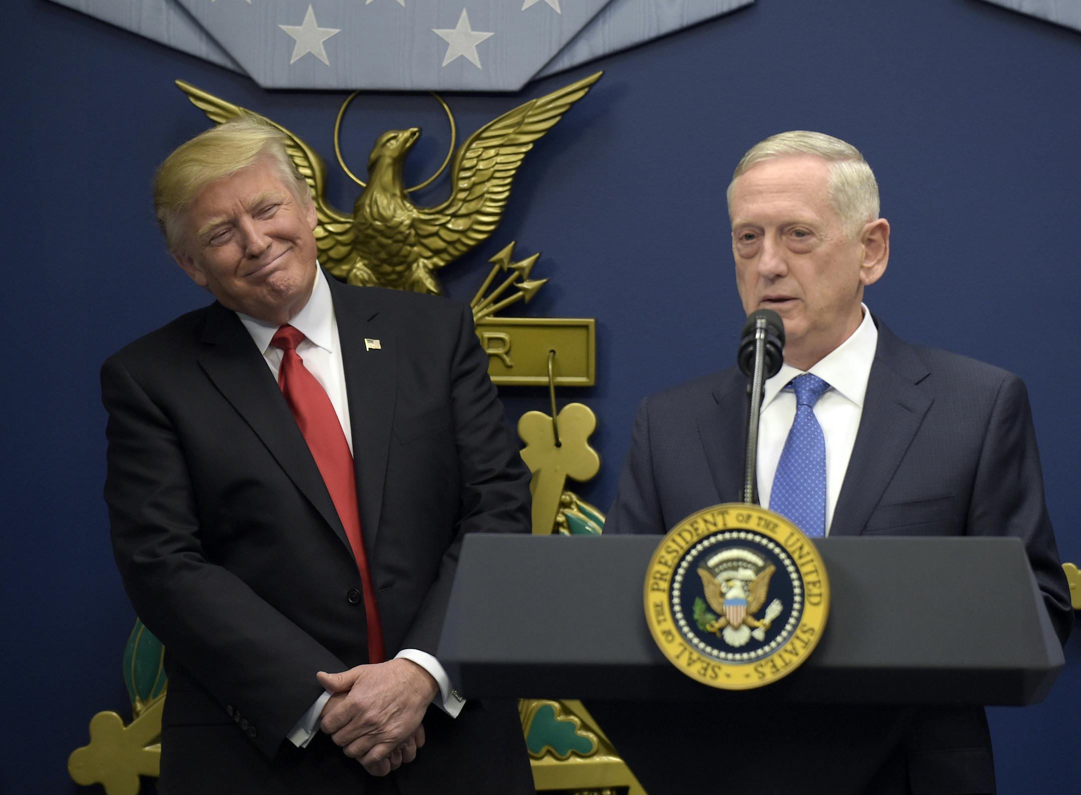 In this Jan. 27, 2017 photo, President Donald Trump, left, listens as Defense Secretary James Mattis, right, speaks at the Pentagon in Washington. With Republicans in charge of Congress, President Donald Trumpís pledge to boost the Pentagonís budget by tens of billions of dollars should be a sure bet. Itís not. (AP Photo/Susan Walsh)