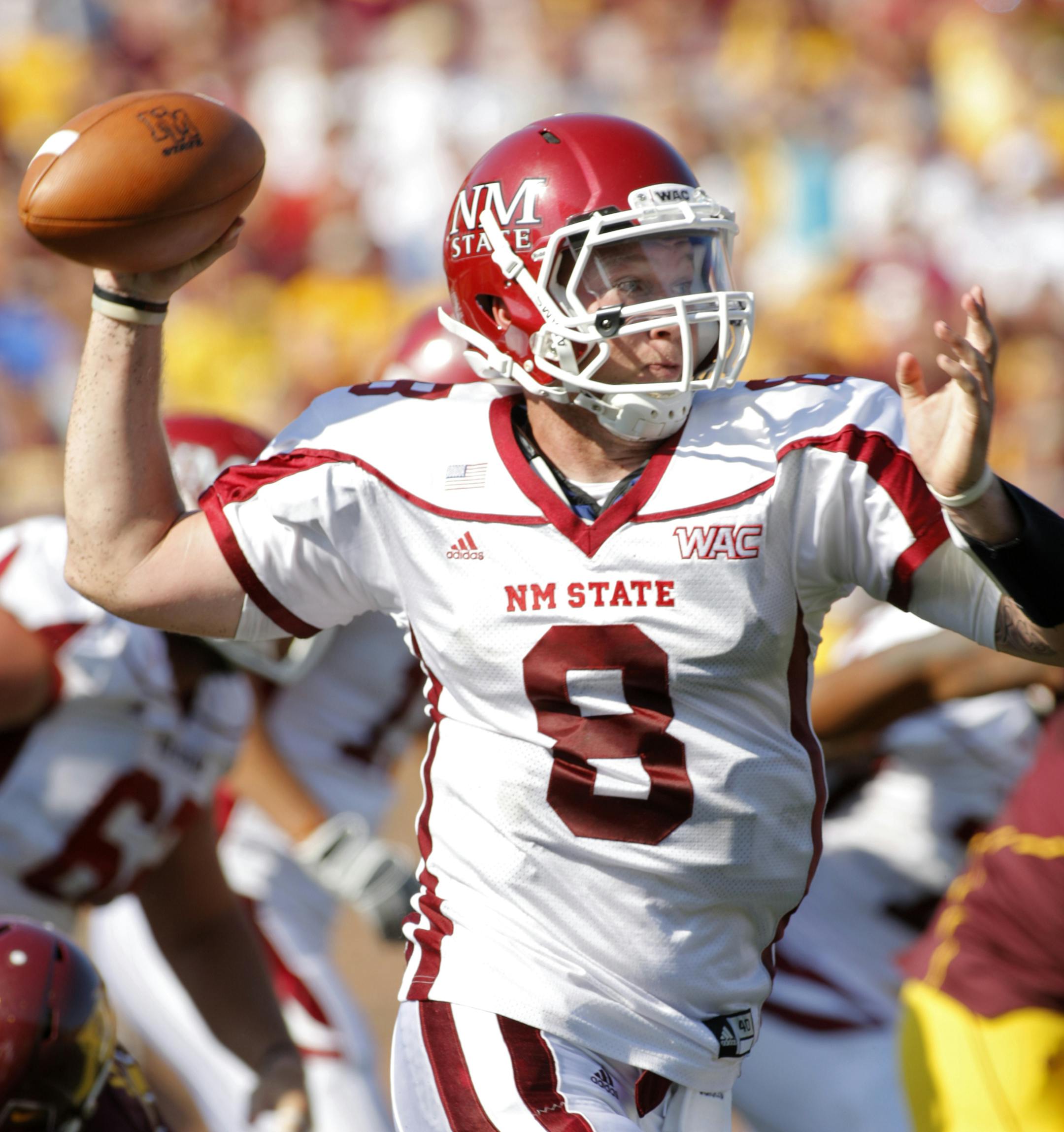 New Mexico State quarterback Andrew Manley plays against Minnesota during an NCAA college football game, Saturday, Sept. 10, 2011 in Minneapolis. (AP Photo/Paul Battaglia) ORG XMIT: NYEOTK