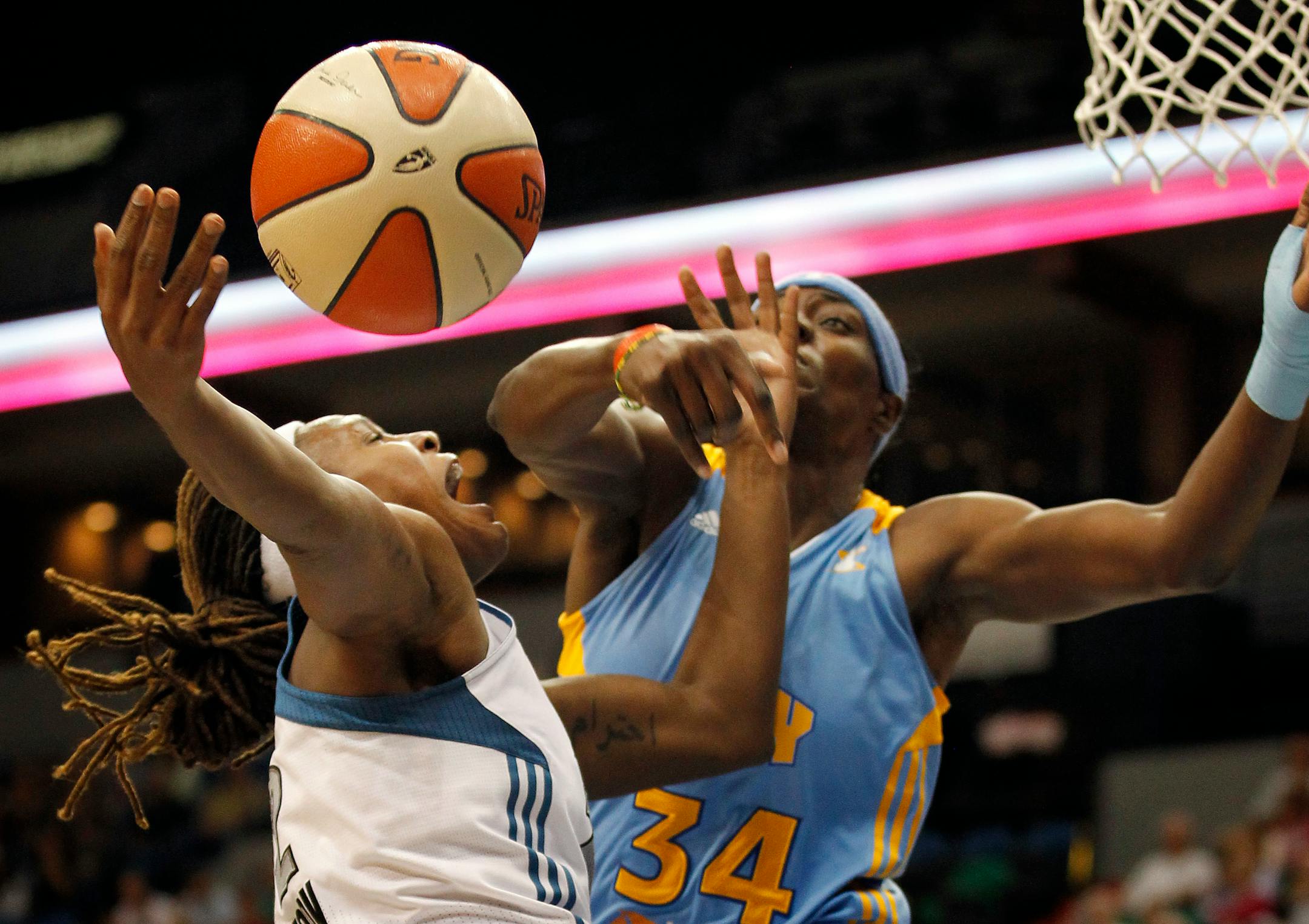 Rebekkah Brunson (32) attempted a shot while being defended by Sylvia Fowles (34) in the first quarter. ] CARLOS GONZALEZ * cgonzalez@startribune.com , September 8, 2011, Minneapolis, Minn, Target Center, WNBA, Minnesota Lynx vs. Chicago Sky