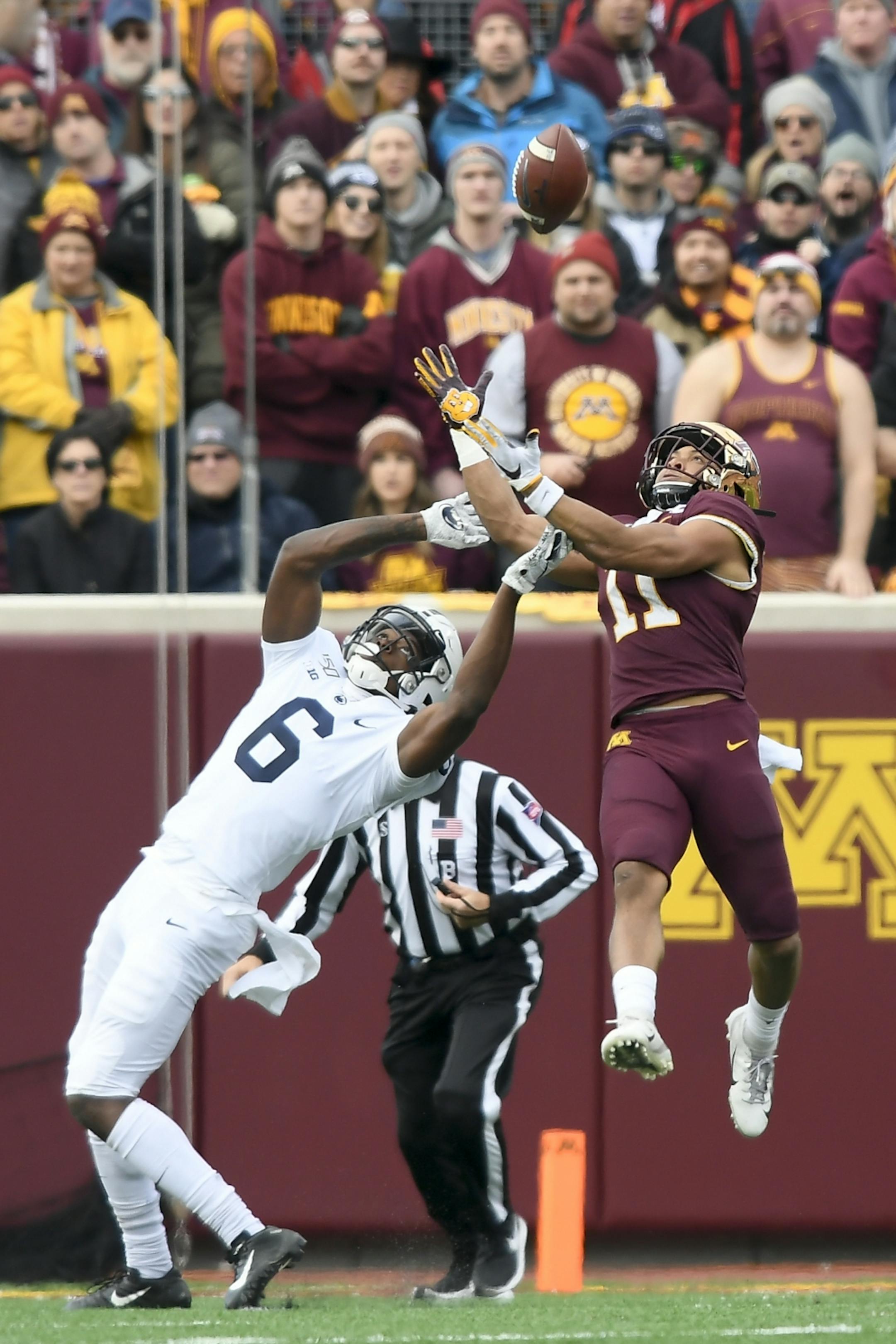 Minnesota Gophers defensive back Antoine Winfield Jr. (11) intercepted a pass intended for Penn State Nittany Lions wide receiver Justin Shorter (6) in the first quarter.