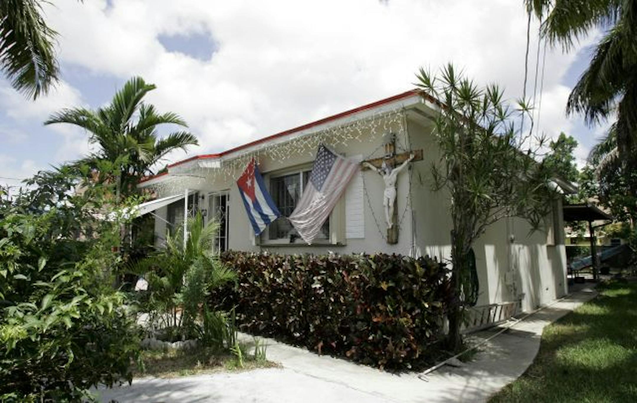 This Aug. 5, 2009 photo shows the house where Elian Gonzalez lived with his relatives in Miami. The house has become a tourist attraction and is open to the public.