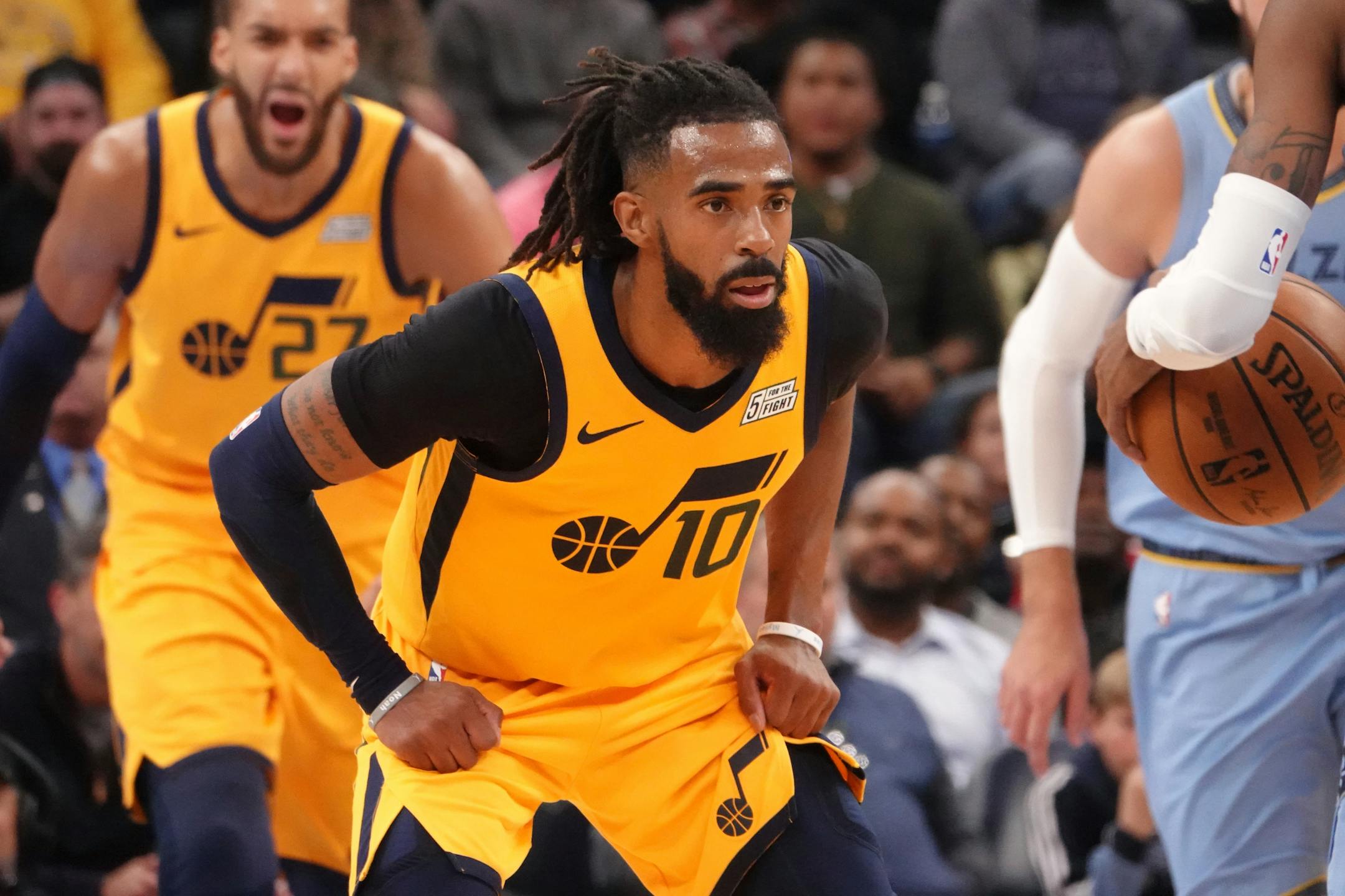 Utah Jazz Mike Conley (10) heads down court in the second half of an NBA basketball game against the Memphis Grizzlies Friday, Nov. 15, 2019, in Memphis, Tenn. (AP Photo/Karen Pulfer Focht)