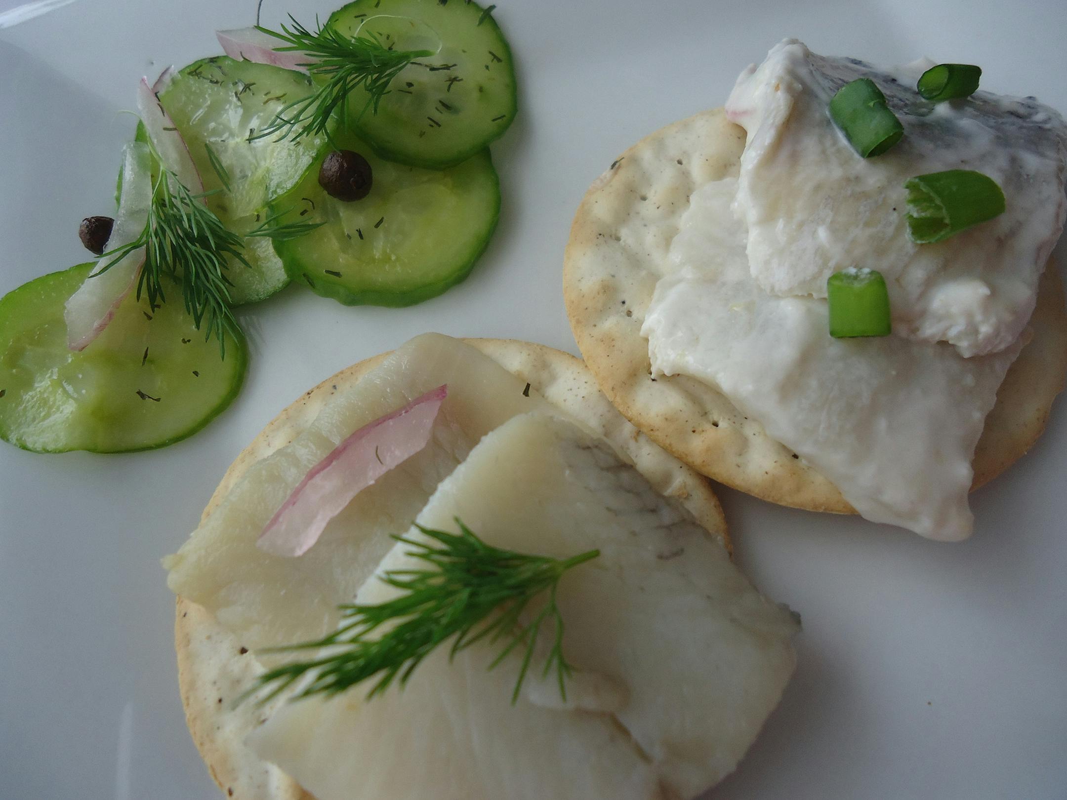 Credit: Patrice Johnson, Special to the Star Tribune Pickled herring, pickled herring in sour cream and horseradish, and quick pickled cucumbers.