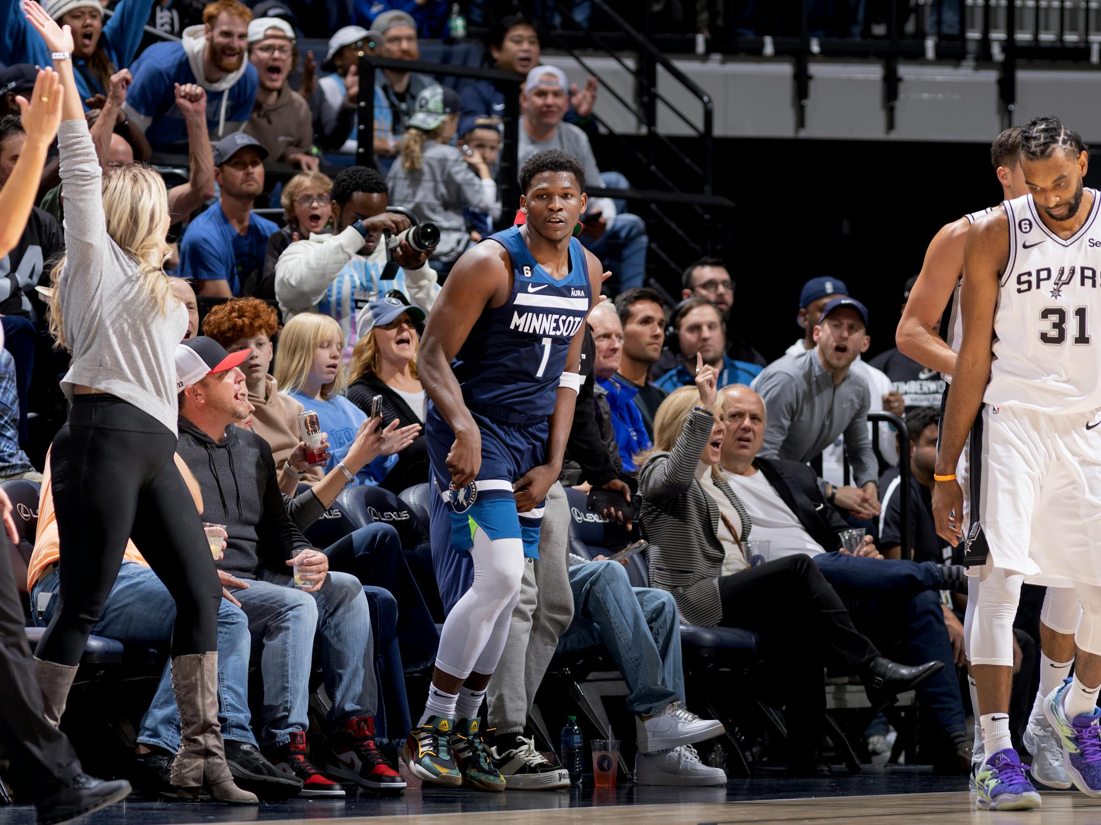 Anthony Edwards (1) of the Minnesota Timberwolves smiles after making a three pointer in third quarter Wednesday, October 26, 2022, at Target Center in Minneapolis, Minn.