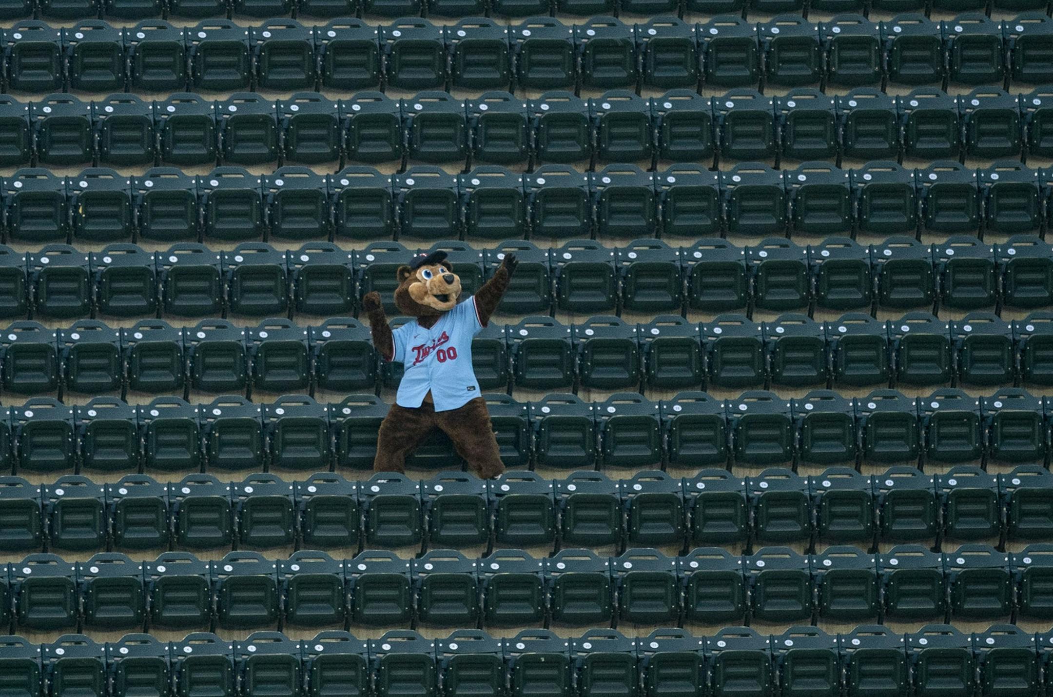 TC Bear, the Minnesota Twins mascot, roamed the empty stands during Wednesday's game.