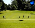 Women&#x2019;s golf league members play a round at Bloomington&#x2019;s Hyland Greens golf course July 28. The course has been operating in the red si