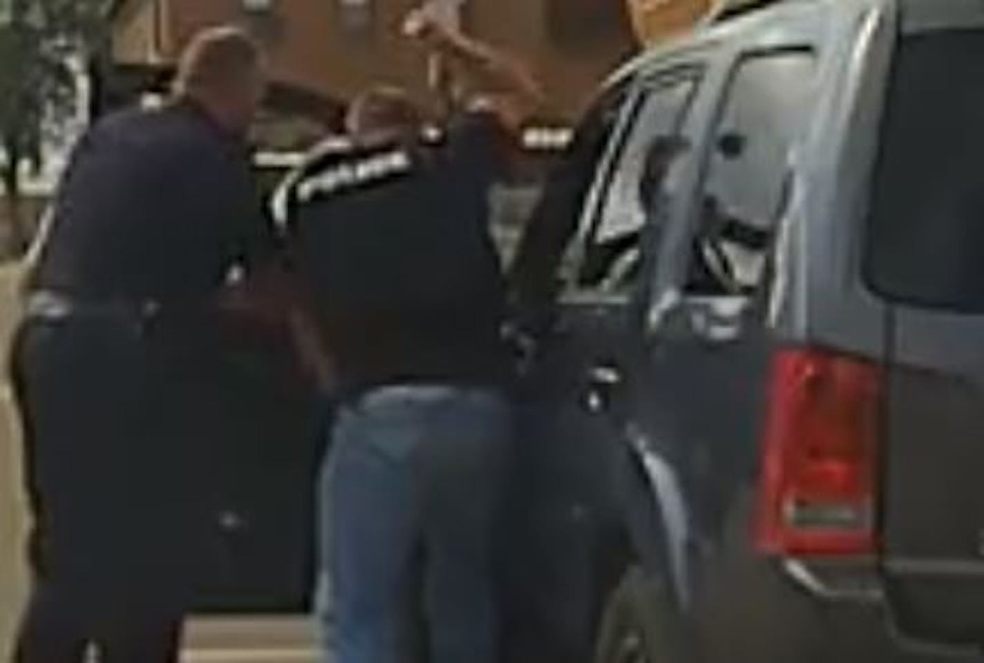 Police squad car video from the July, 28, 2016, stop showed Joe Joswiak, a member of the Buffalo Ridge Drug Task Force and a Worthington police officer (right), throwing punches and an elbow before putting on handcuffs.