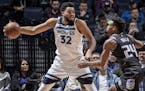 Karl-Anthony Towns can dunk and work the post, but the Wolves want their big man to shoot more three-pointers in a modernized offense.