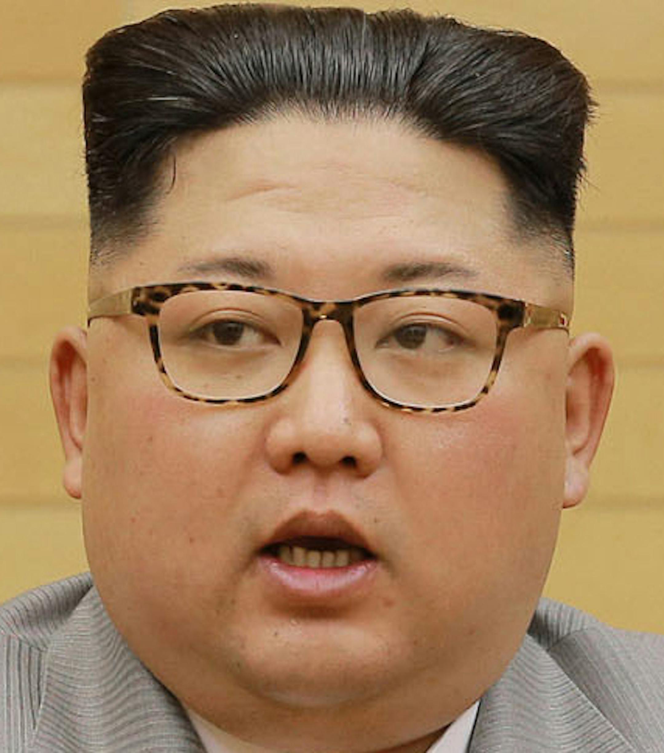 In this photo provided by the North Korean government, North Korean leader Kim Jong Un delivers his New Year's speech at an undisclosed place in North Korea Monday, Jan. 1, 2018. Kim said Monday the United States should be aware that his country's nuclear forces are now a reality, not a threat. Independent journalists were not given access to cover the event depicted in this image distributed by the North Korean government. The content of this image is as provided and cannot be independently ver