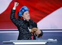 Comedian Stephen Colbert clowns around on the stage at the Republican National Convention in Cleveland, Sunday, July 17, 2016.