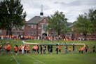 A ceremony outside the former Kamloops Indian Residential School in British Columbia on May 31. The remains of 215 children were discovered buried nea