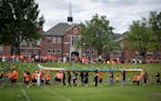 A ceremony outside the former Kamloops Indian Residential School in British Columbia on May 31. The remains of 215 children were discovered buried nea